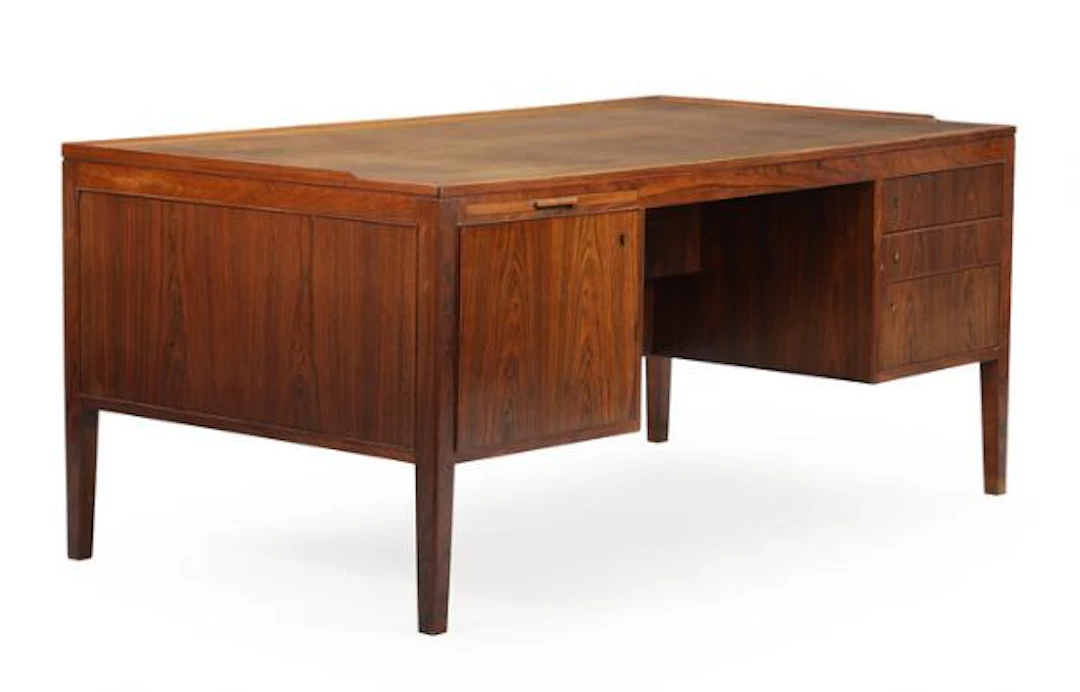Danish cabinetmaker: Freestanding rosewood desk with moulded top edge.