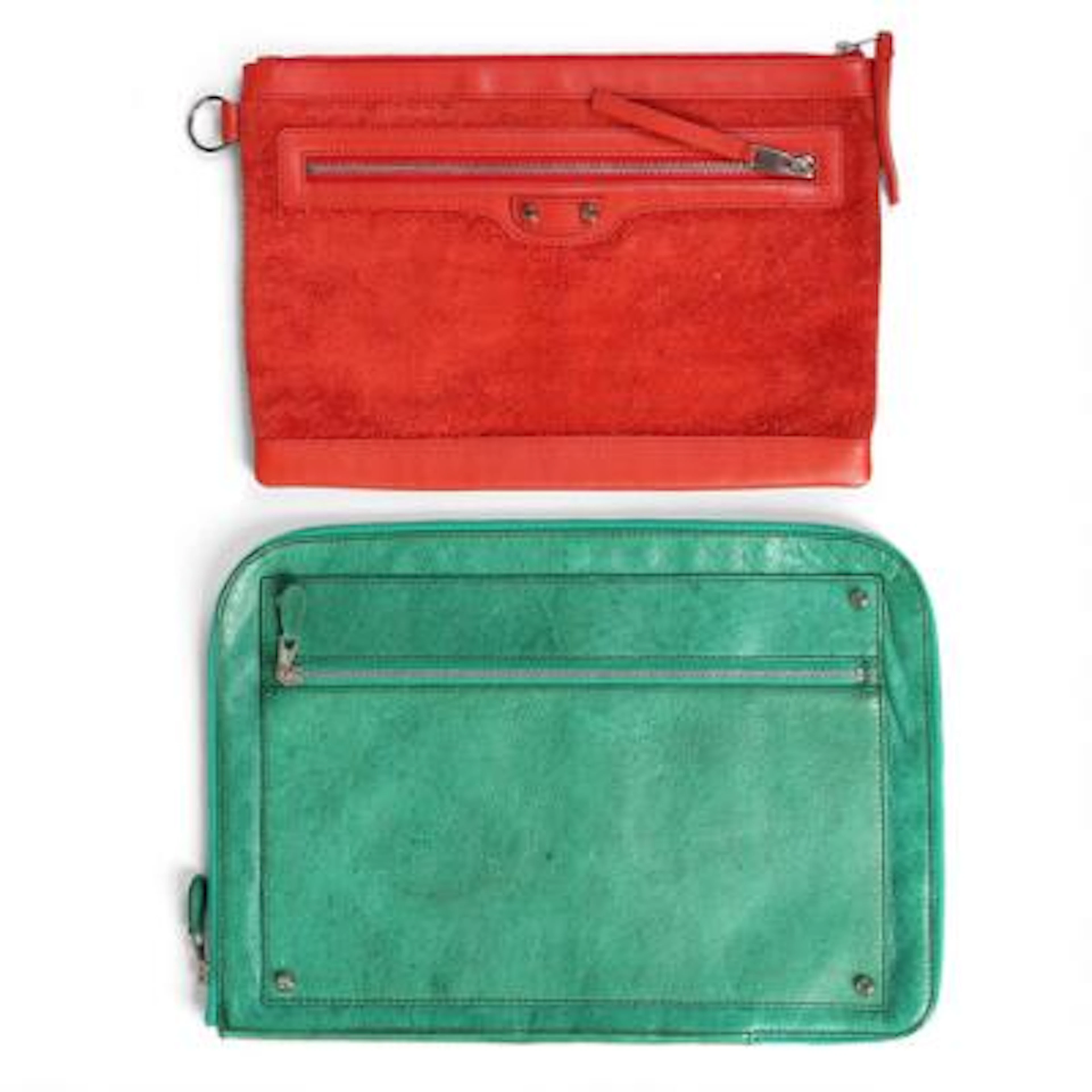 Balenciaga: A set comprising of two clutches of respectively red leather