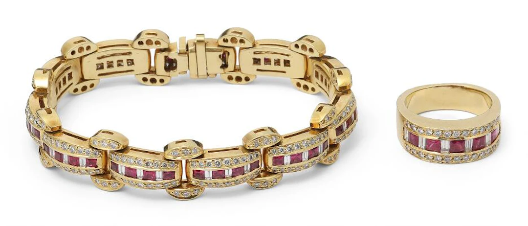 A ruby and diamond jewellery set comprising of a bracelet and a ring