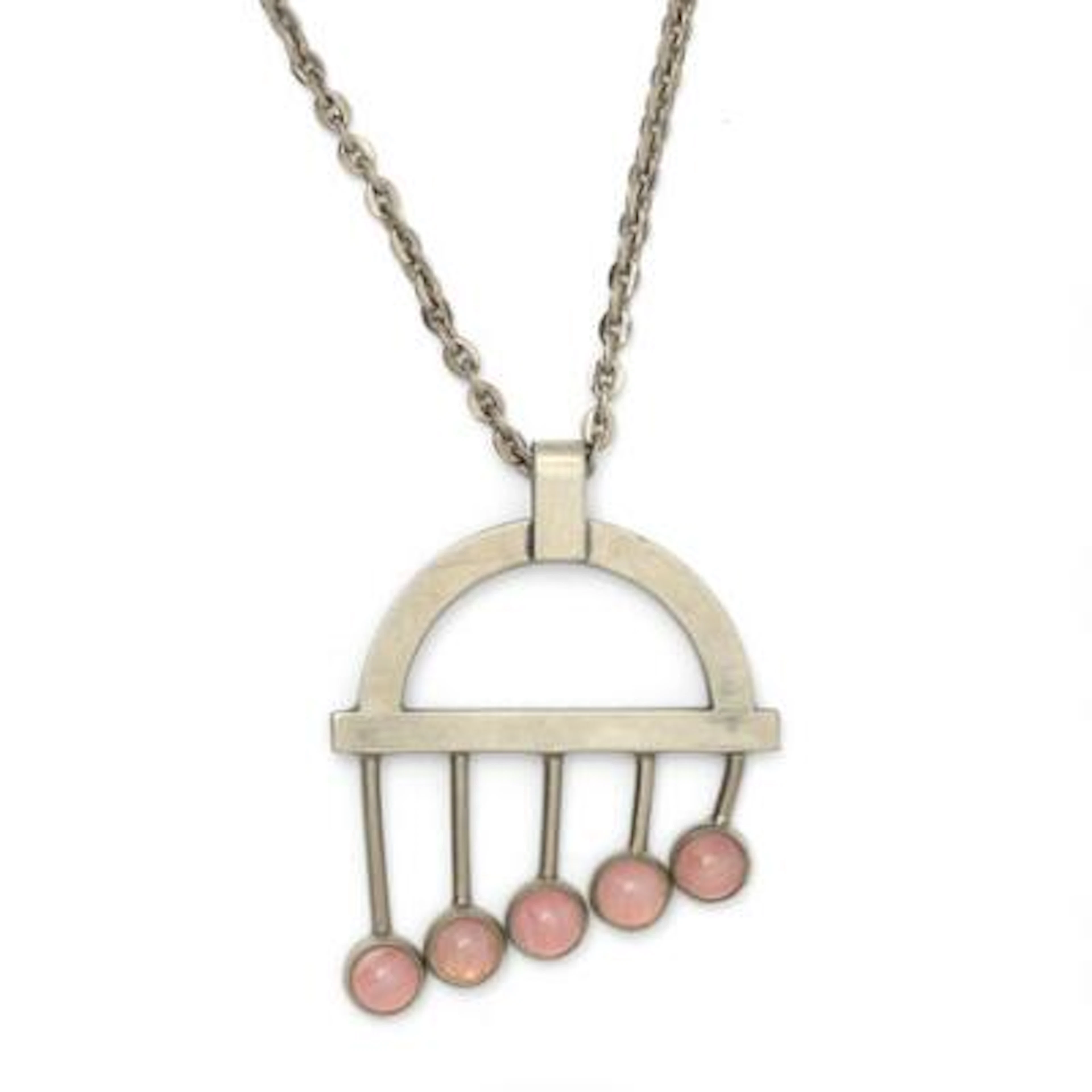 Jørgen Jensen Pewter: A pendant set with rose coloured glass, mounted