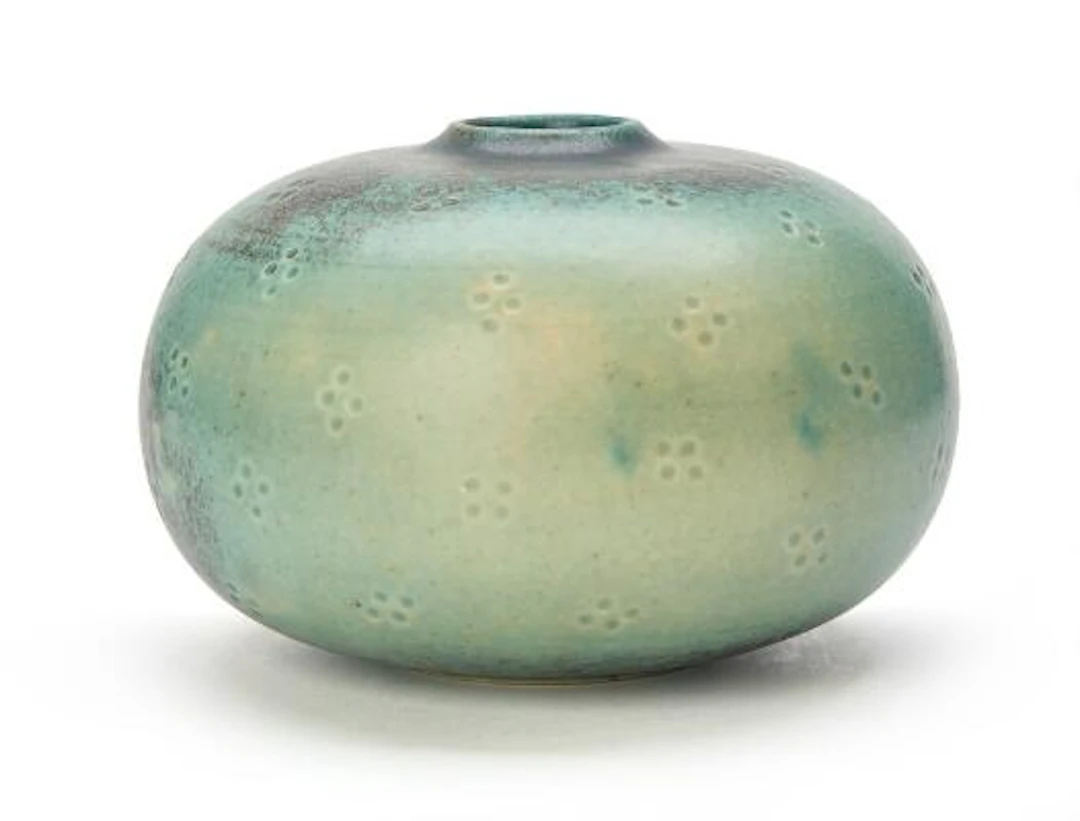 Saxbo: A round stoneware vase, modelled with a narrow opening. Made