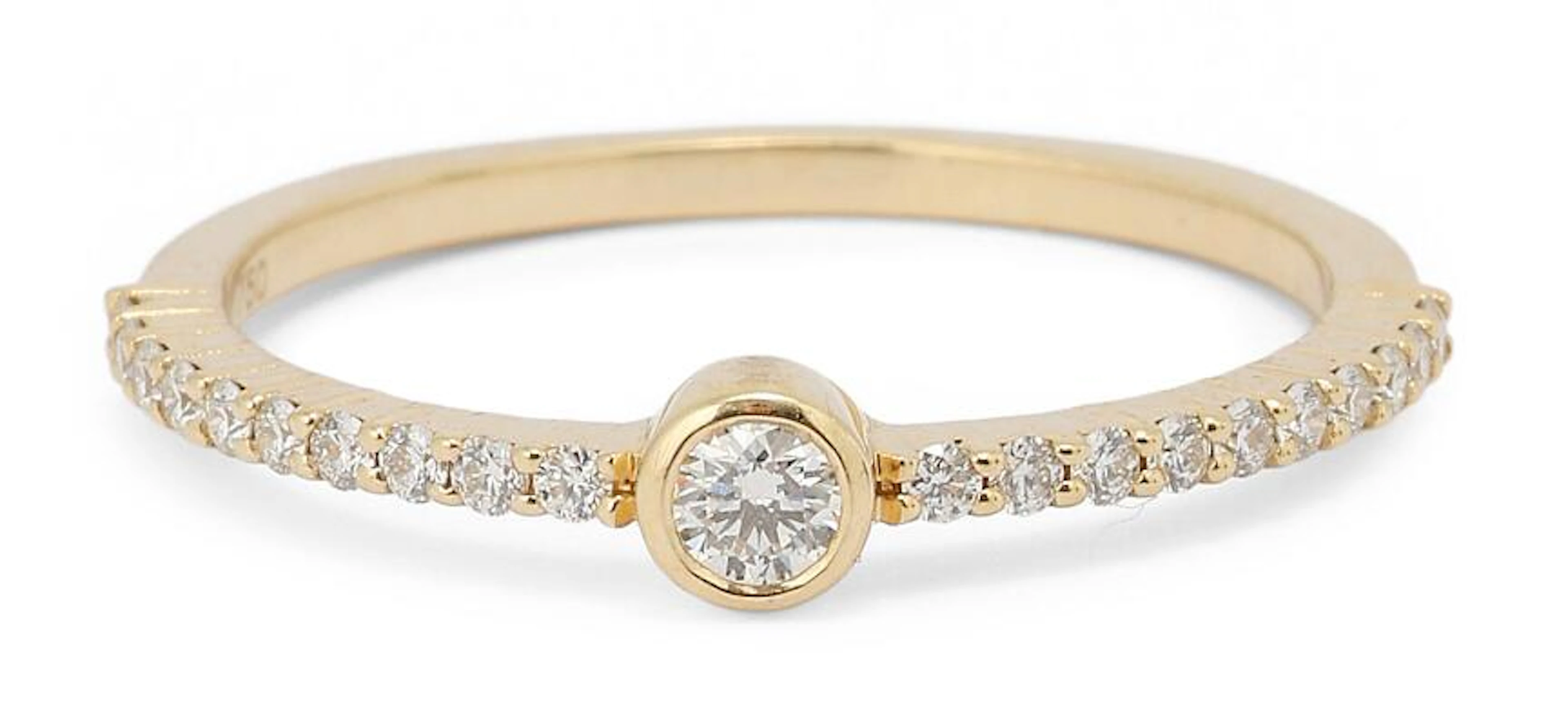 A diamond ring set with numerous brilliant-cut diamonds mounted in
