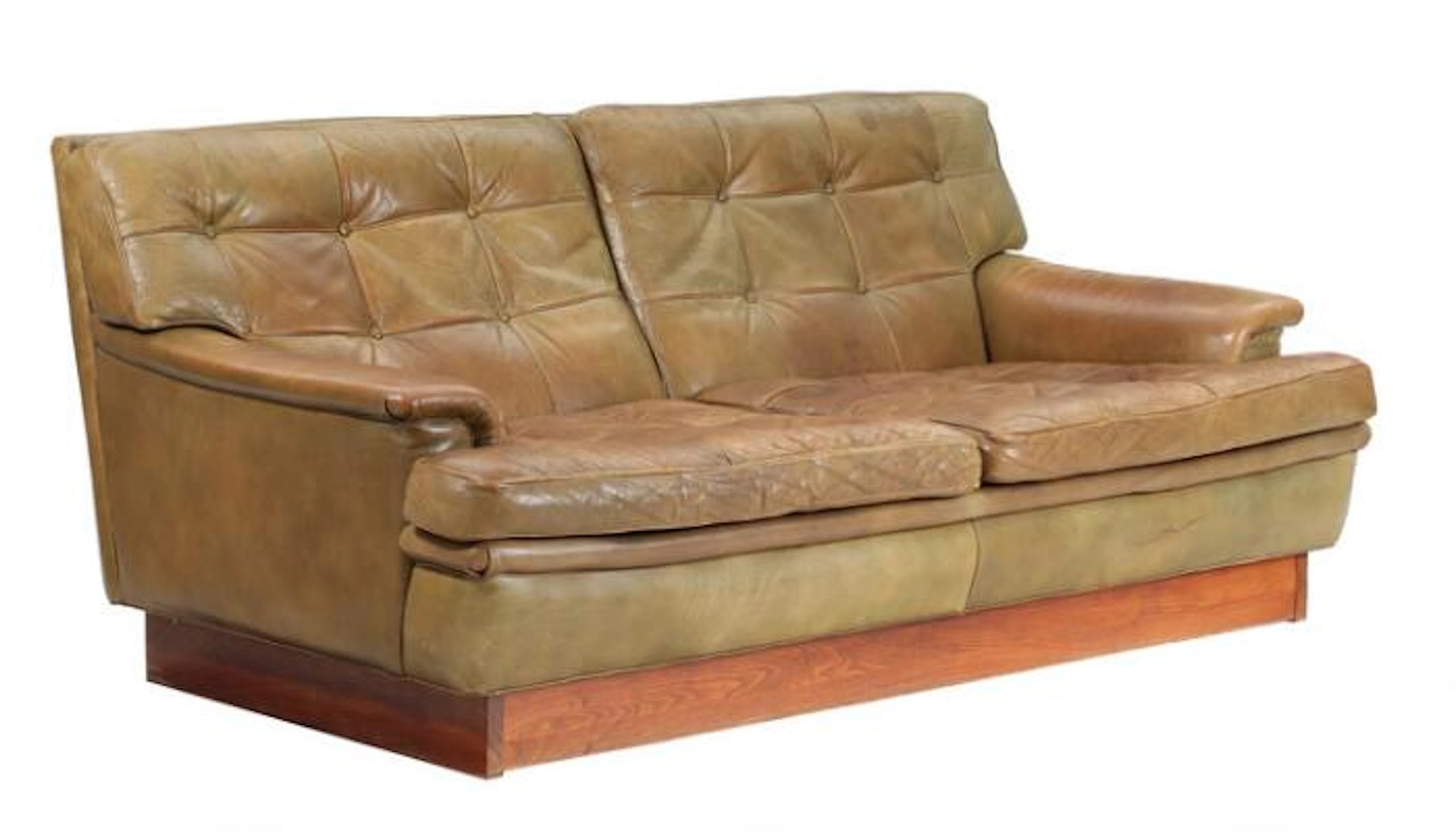 Arne Norell: “Mexico”. Two seater sofa with beech plinth. Seat, sides