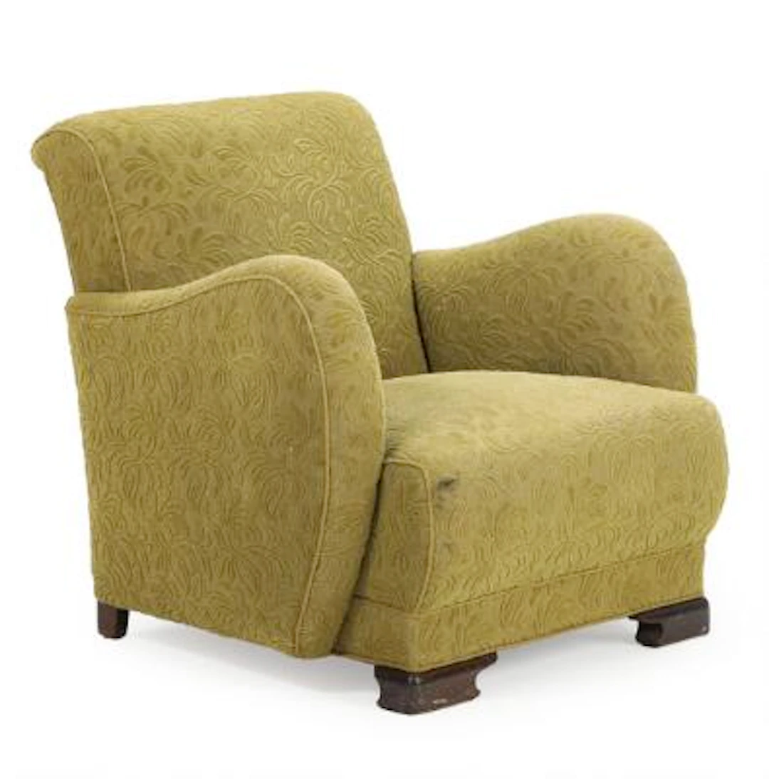 Danish furniture design: Easy chair with dark stained beech legs
