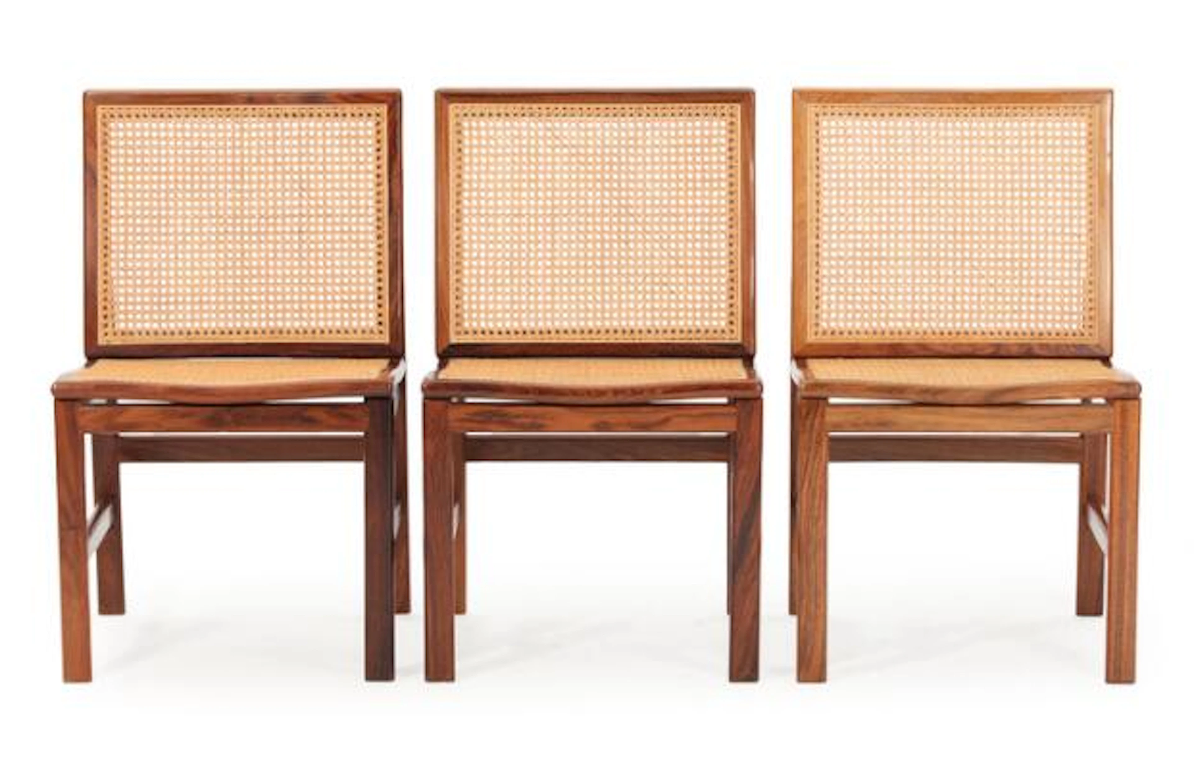 Danish furniture design: Three rosewood chairs, suspended in seat