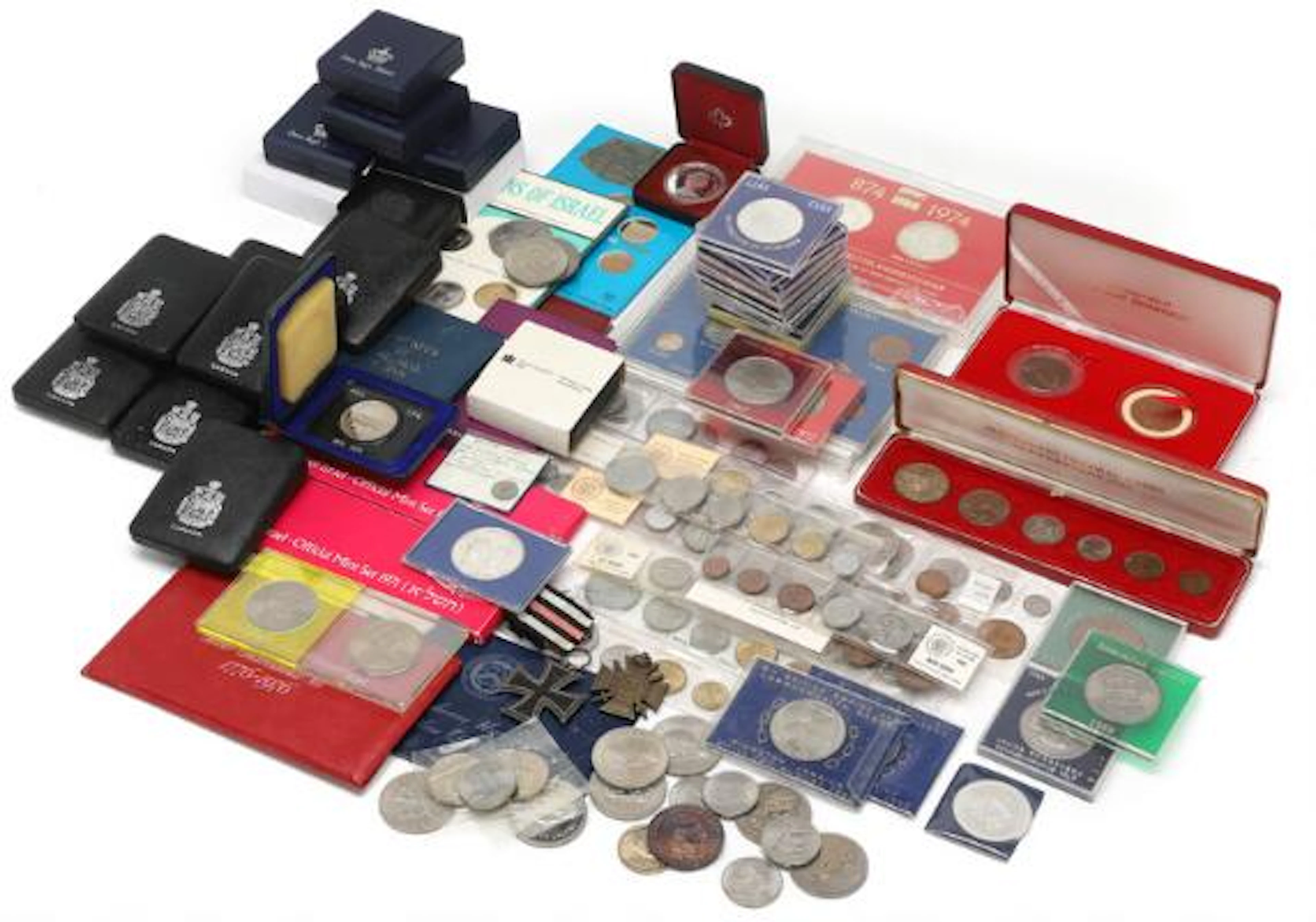 Collection of coin sets and single coins in boxes from, among others