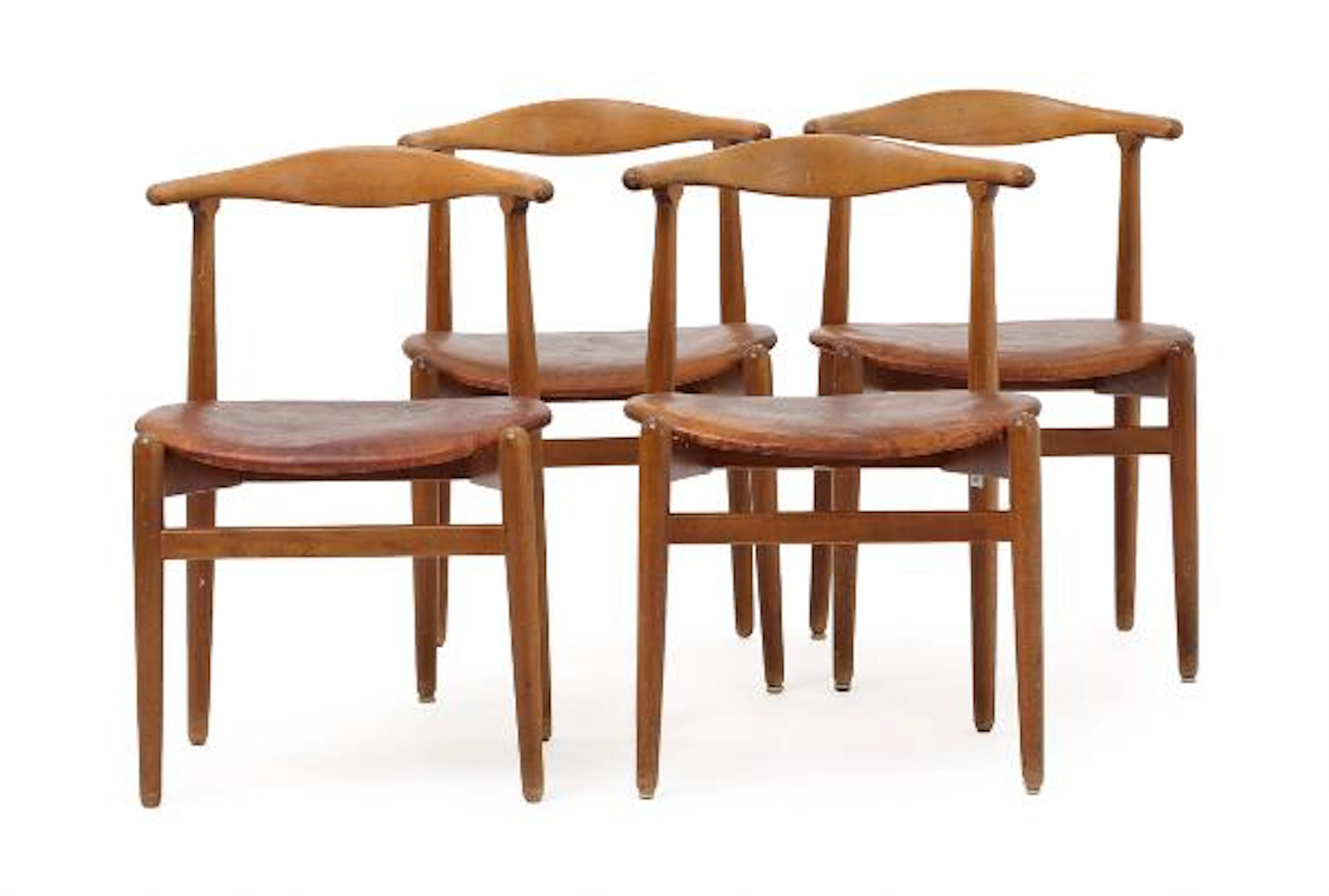 Hans J. Wegner: "FH 1934". Four rare, stained beech armchairs. Upholstered