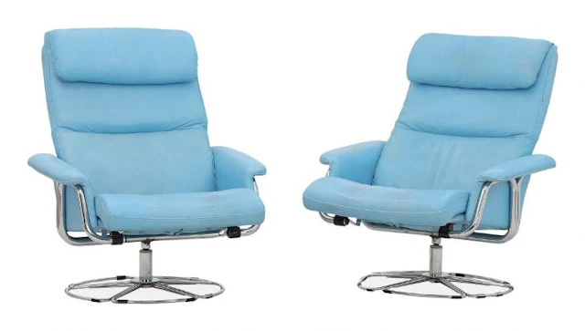 Scandinavian furniture design: A pair of chromed steel easy chairs.