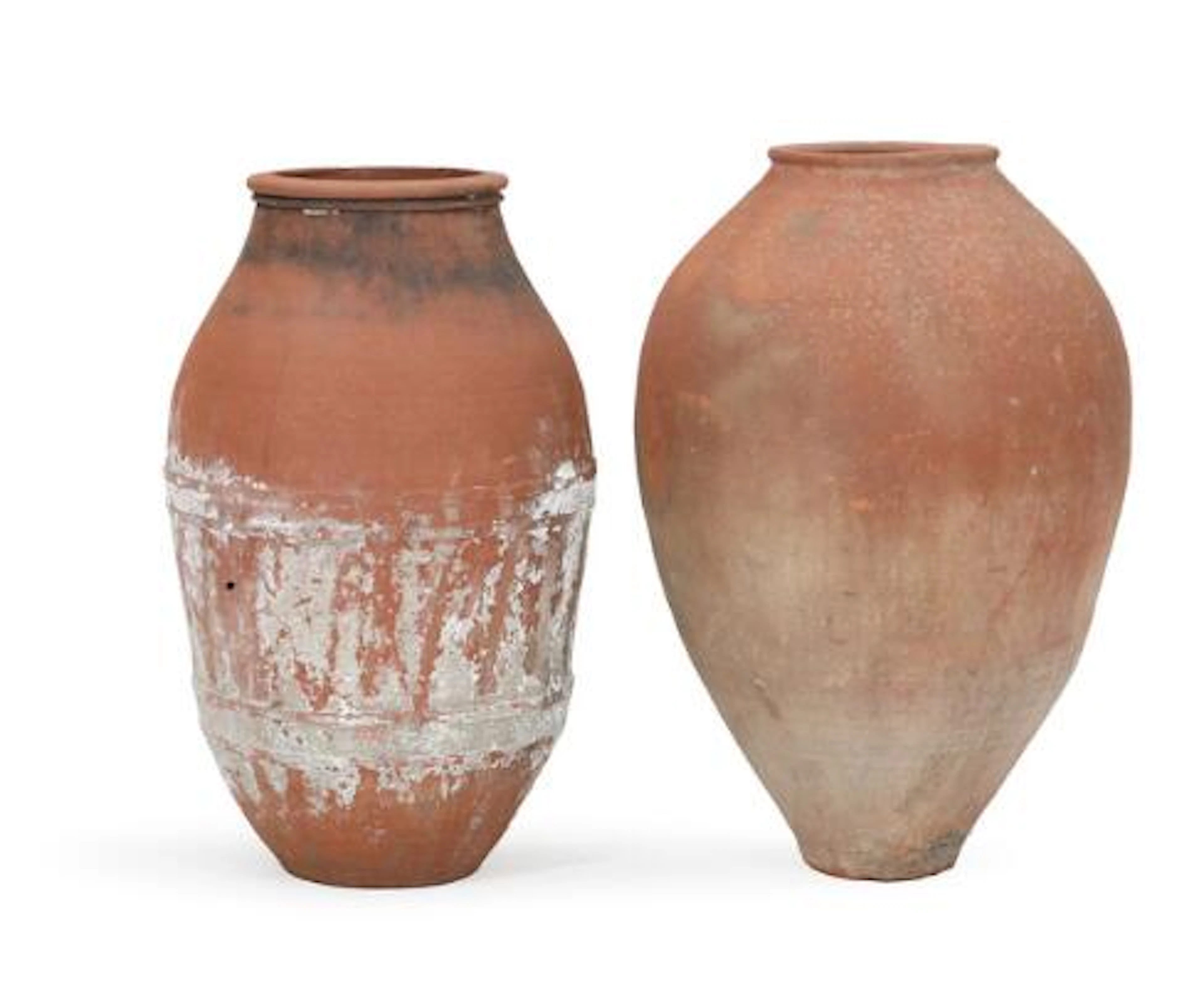 Two east Mediterranean tercotta storage jars. 20th century. H. 68
