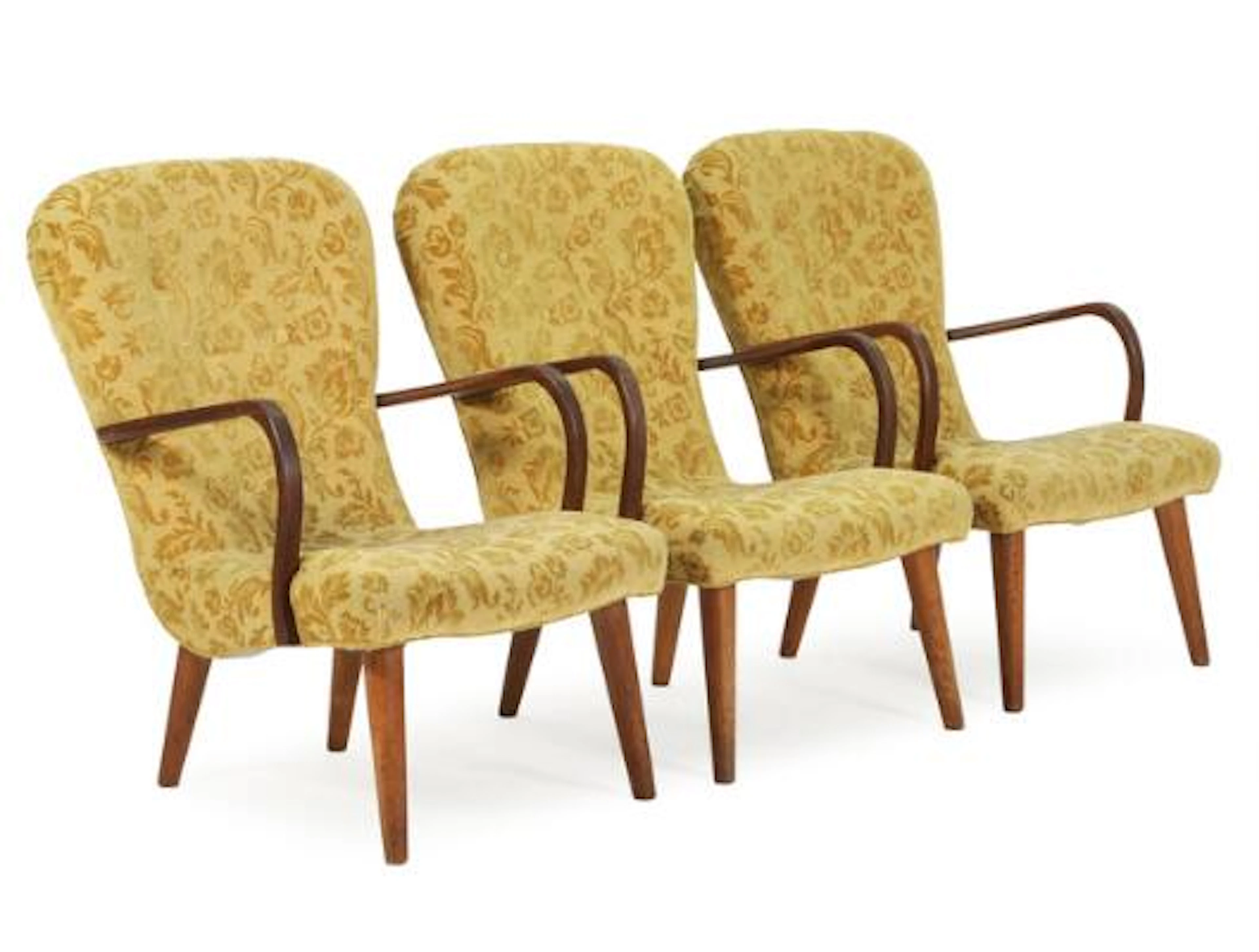 Danish furniture design: Three easy chairs with oak legs and mahogany