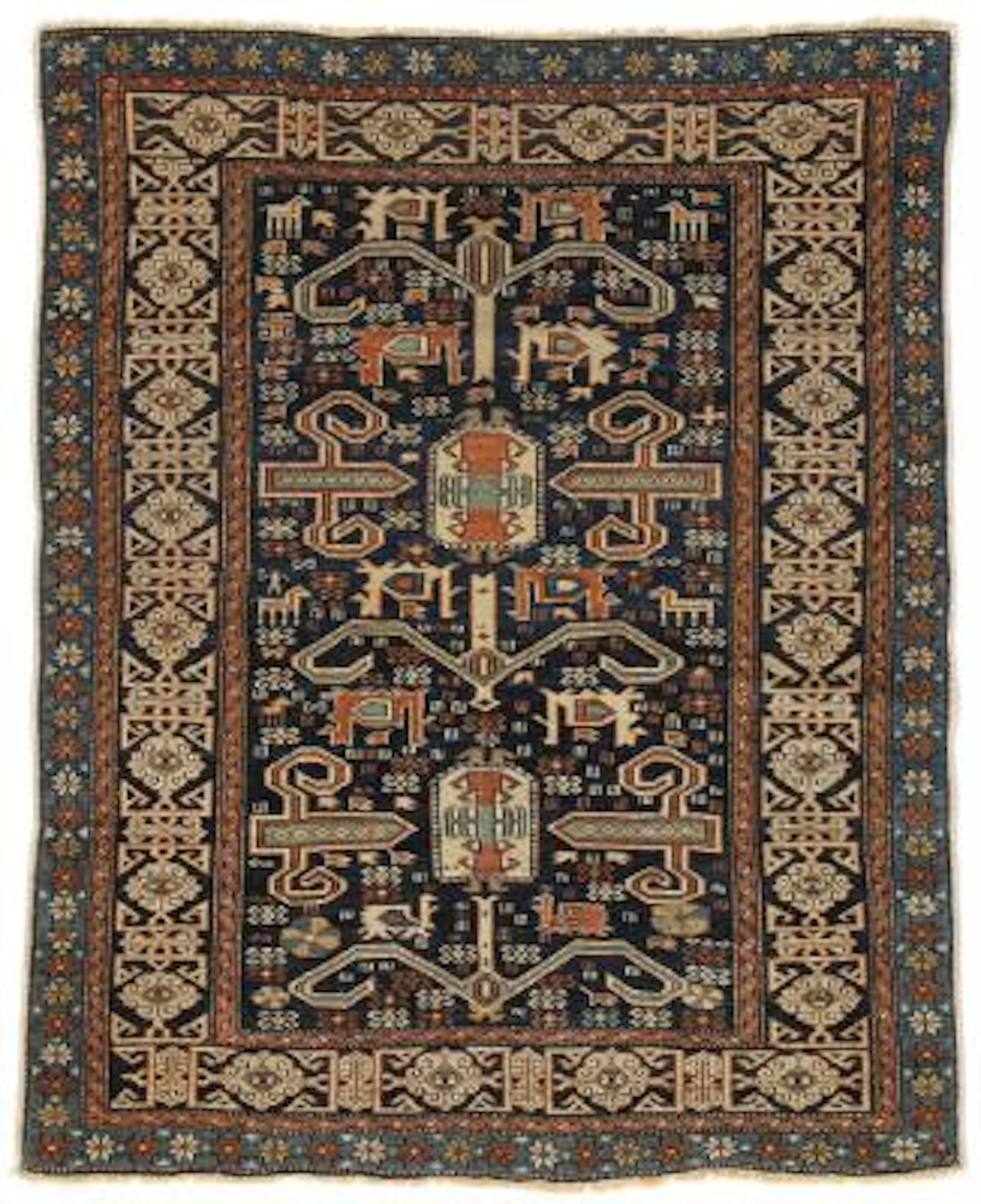 An antique Perepedil rug, Caucasus. Design with classical buck horns.