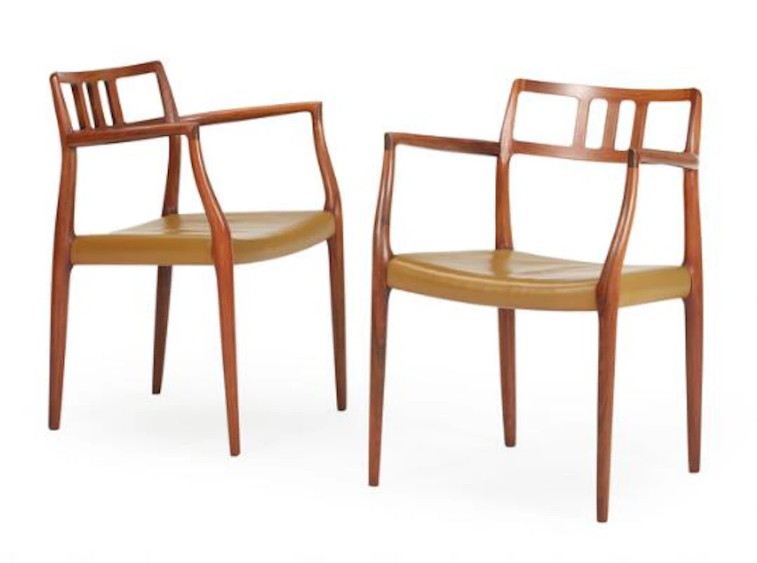 Niels O. Møller: A pair of armchairs with rosewood frame. Model 64.