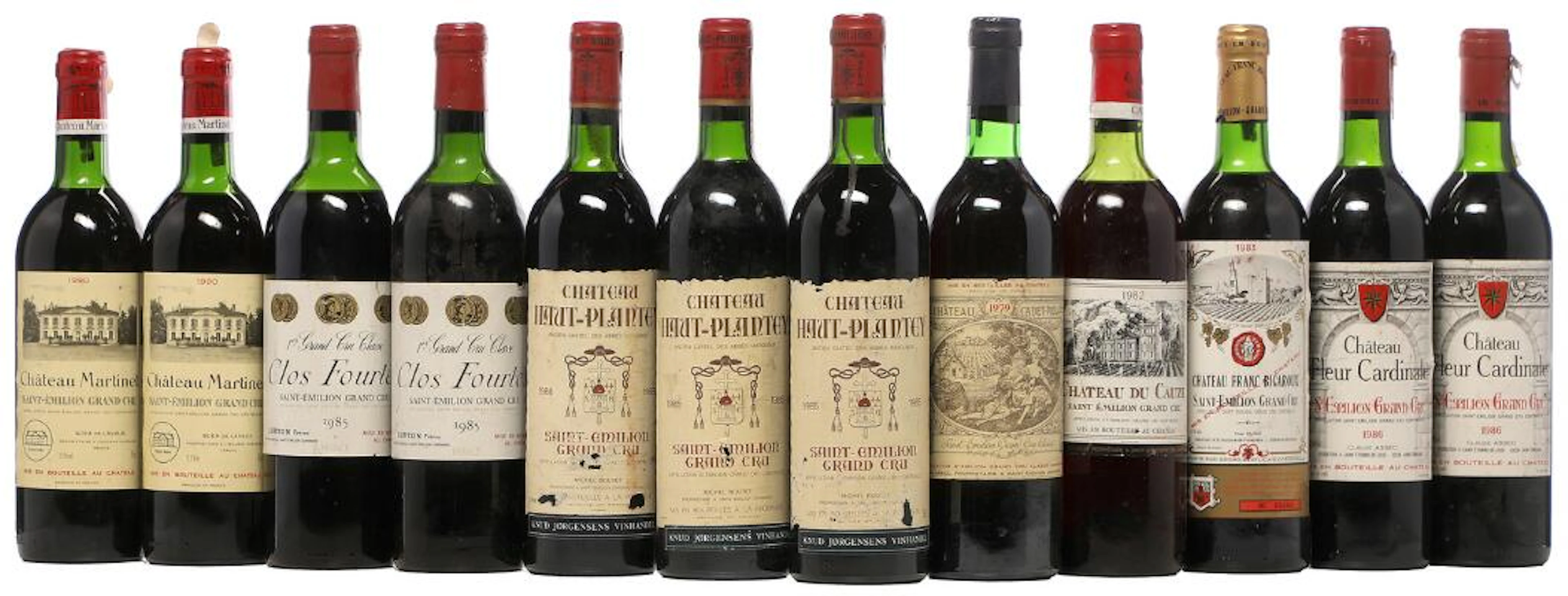 2 bts. Château Martinet, Saint-Émilion Grand Cru 1990 B (ts/us). etc.
