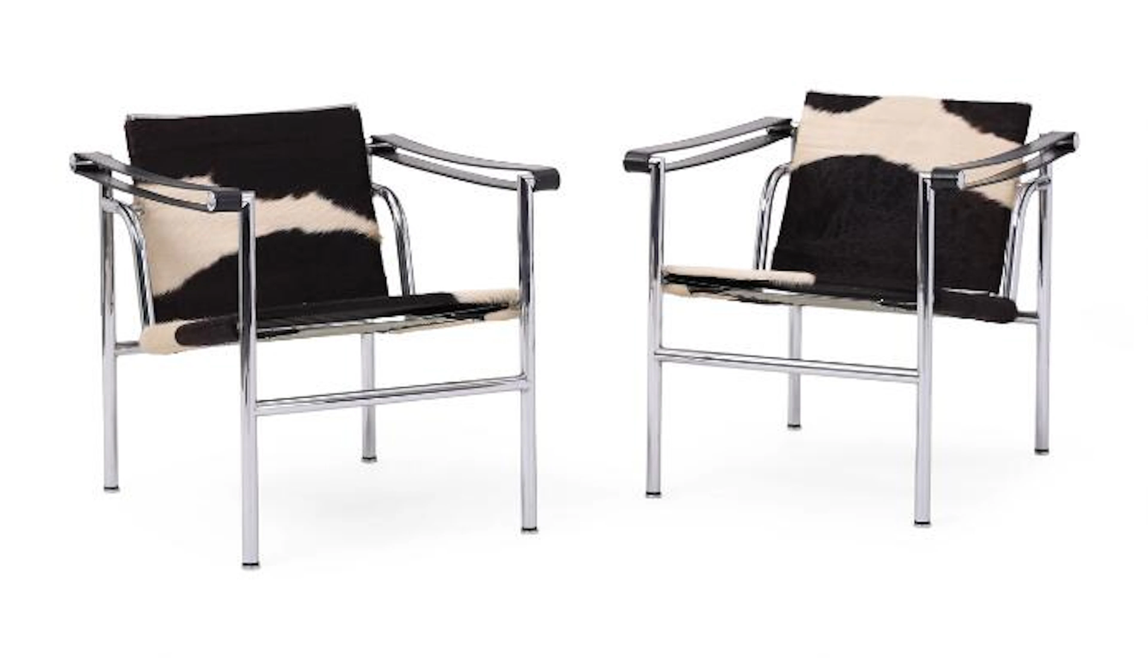Le Corbusier: “LC1”. A pair of armchairs with chromed steel frame.