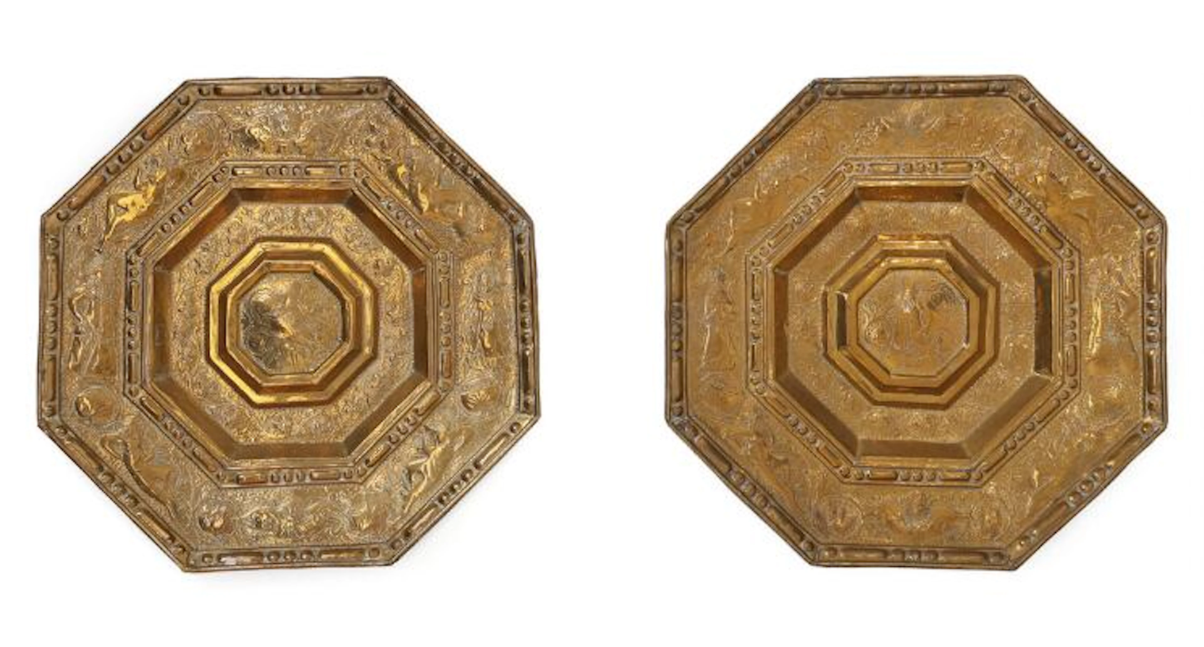 A pair of probably Danish mid-17th century Baroque brass light shields.