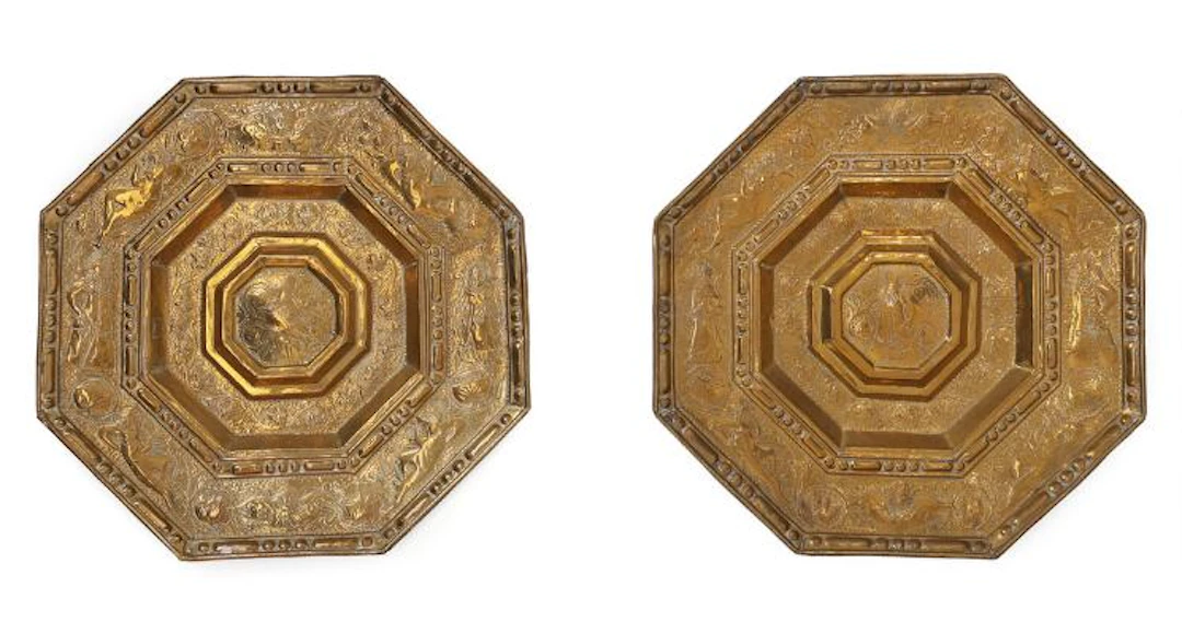 A pair of probably Danish mid-17th century Baroque brass light shields.