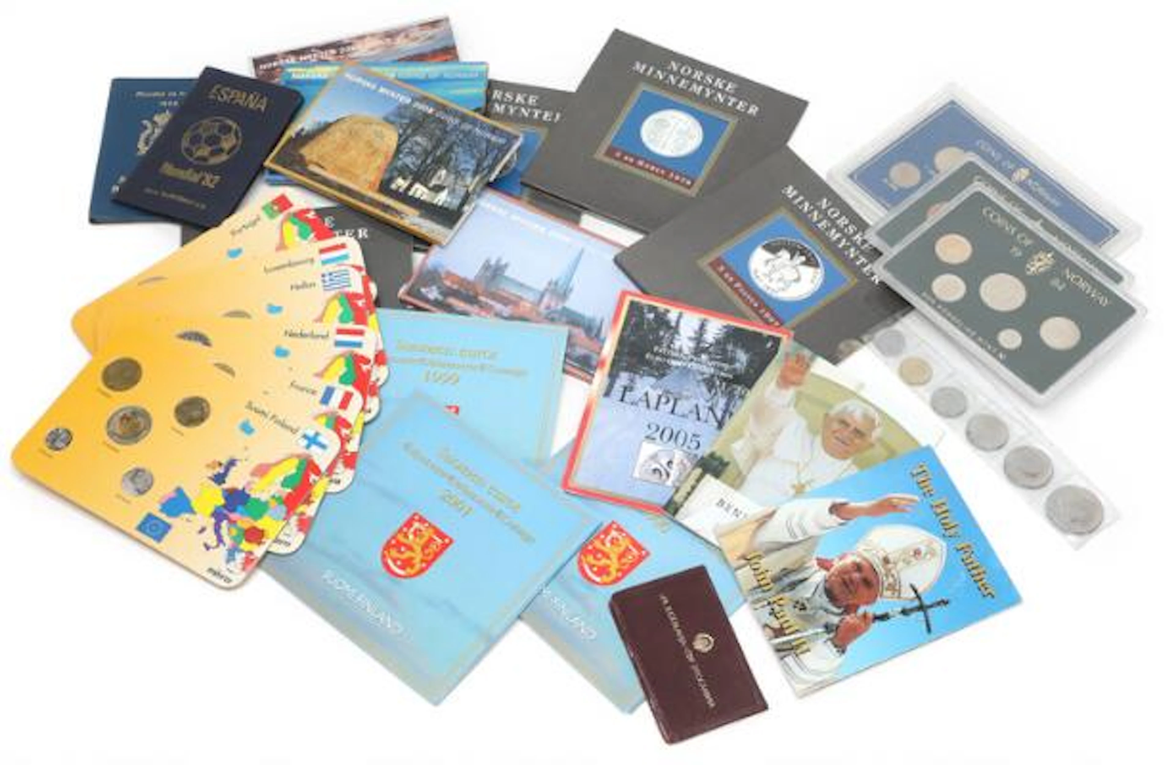Collection of coin sets relating to Finland, France, Greece, the Netherlands