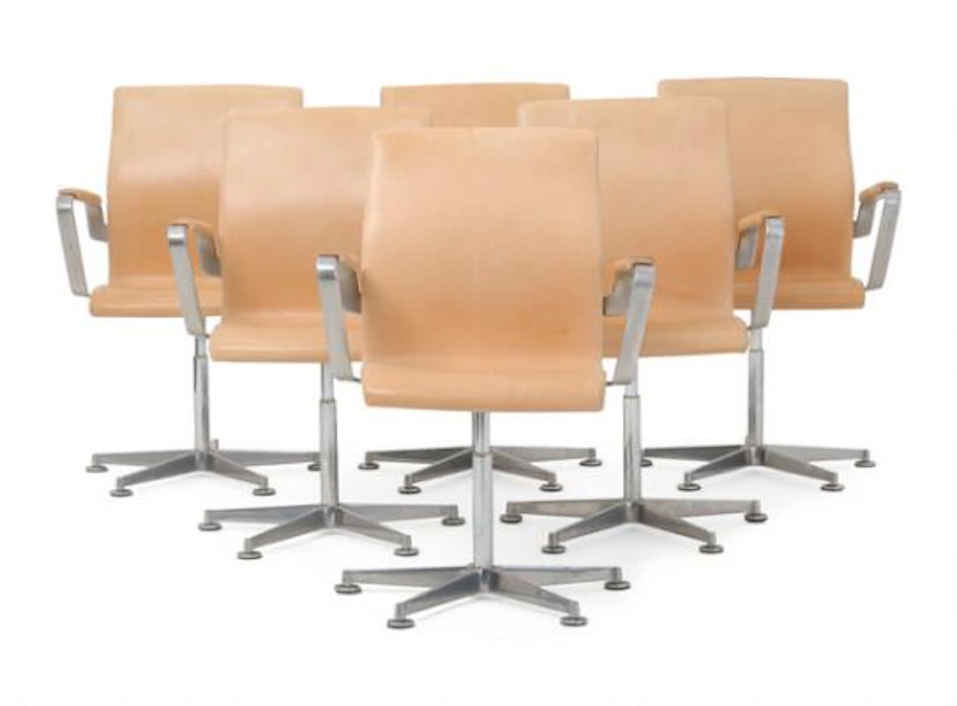 Arne Jacobsen: "Oxford". Set of six armchairs in aluminium. Upholstered