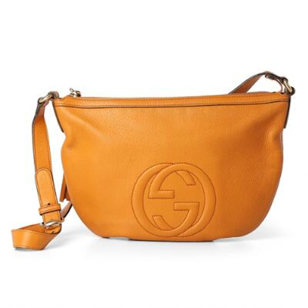 Gucci: A Soho Small Crossbody" bag of orange leather with gold tone