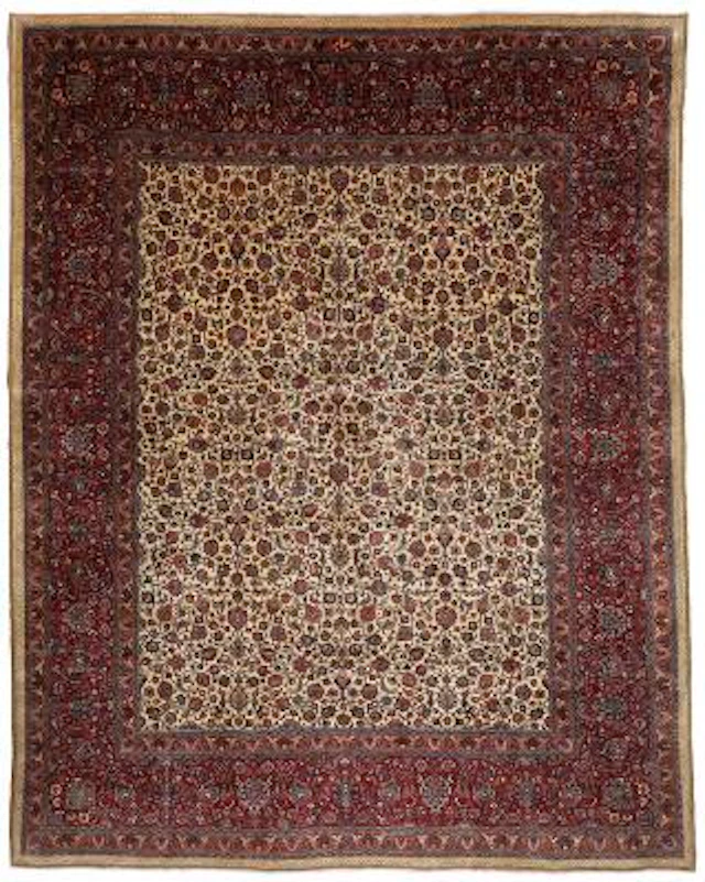 A signed Saber Mashad carpet, Persia. All over design of palmettes