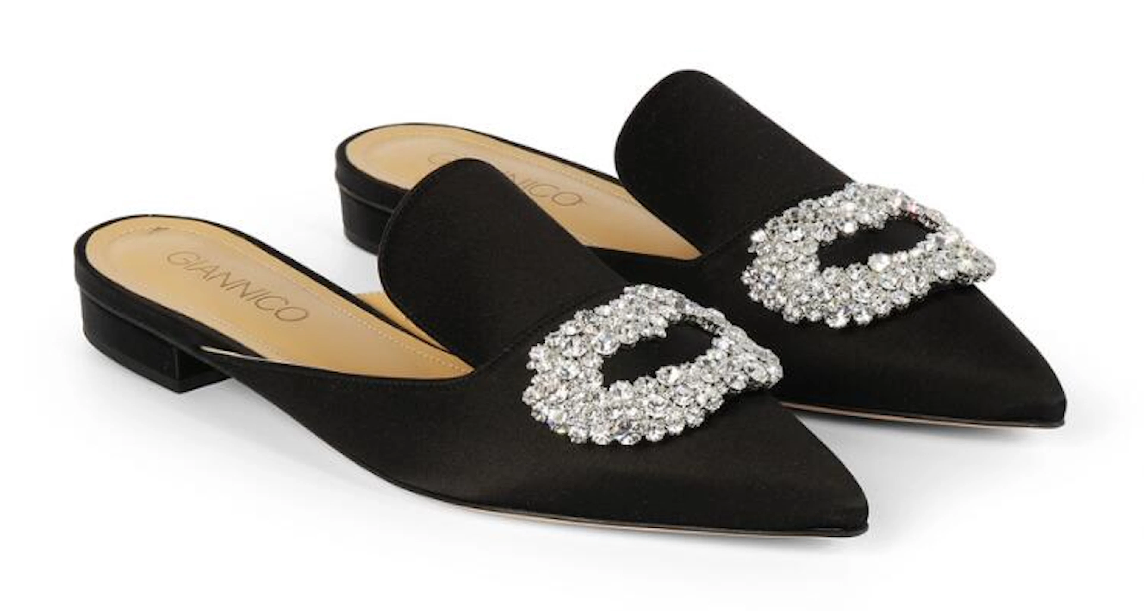 Gianico: A pair of black mules with crystal details on the fronts.