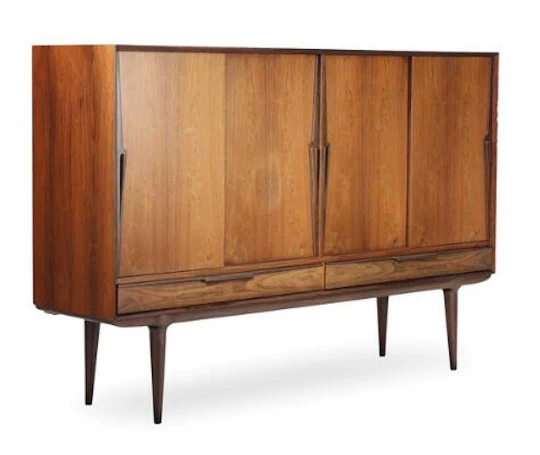 Gunni Omann: A rosewood sideboard, front with two drawers and four