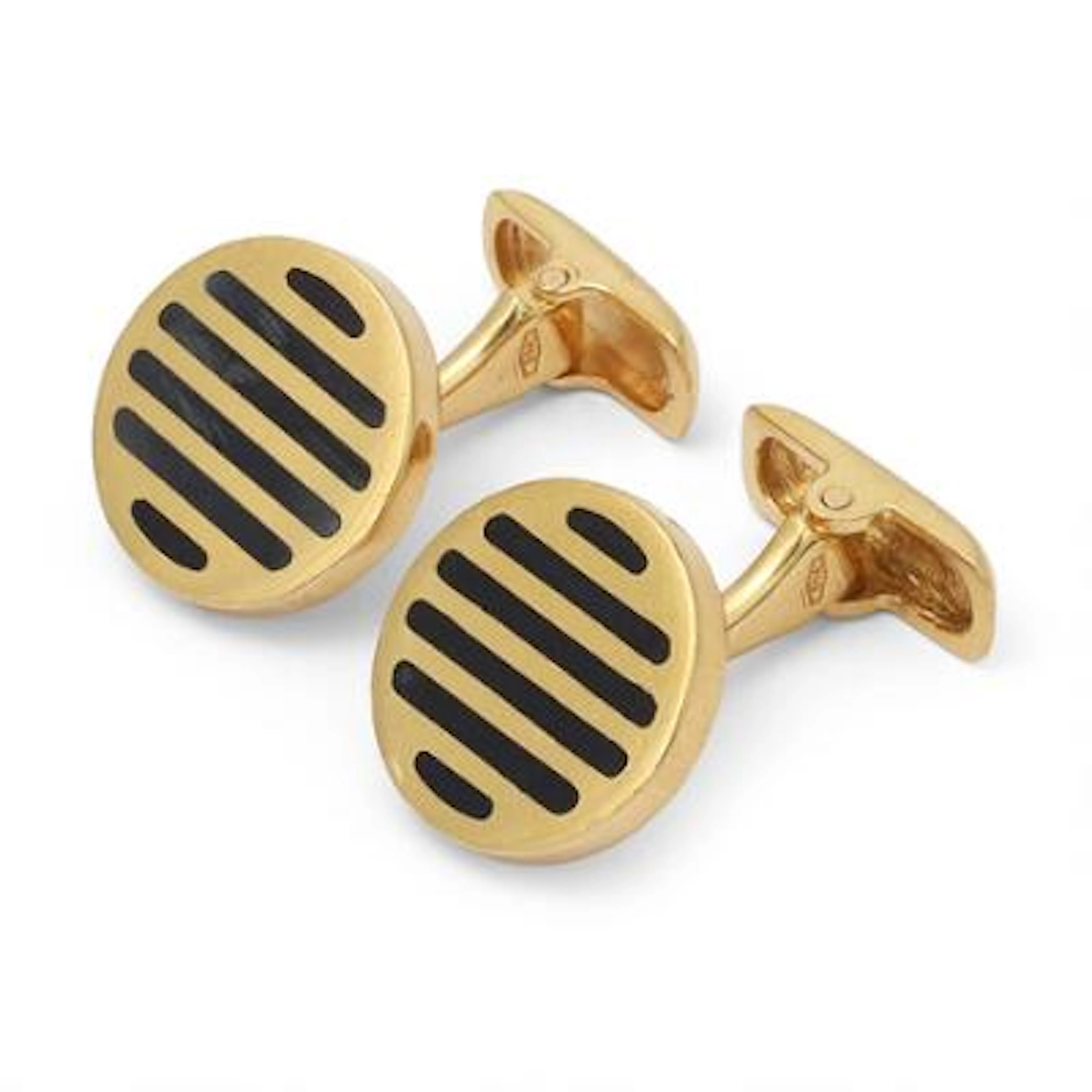 A pair of Italian cufflinks of 18k gold decorated with black enamel.