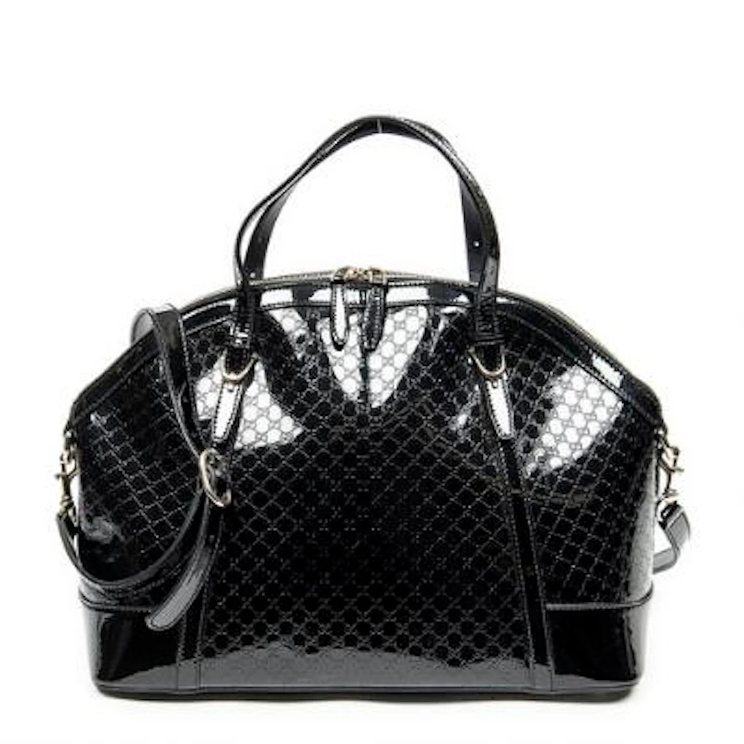 Gucci: A "Large Nice Dome Tote" of black patent leather with silver