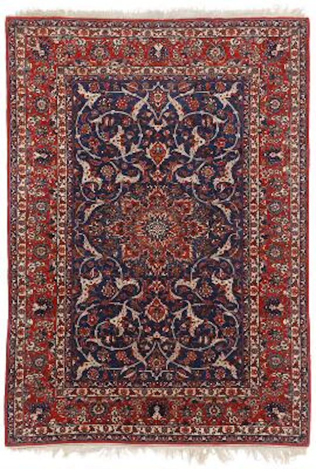 An Isfahan carpet, Persia. Medallion design on a blue field. Mid-20th