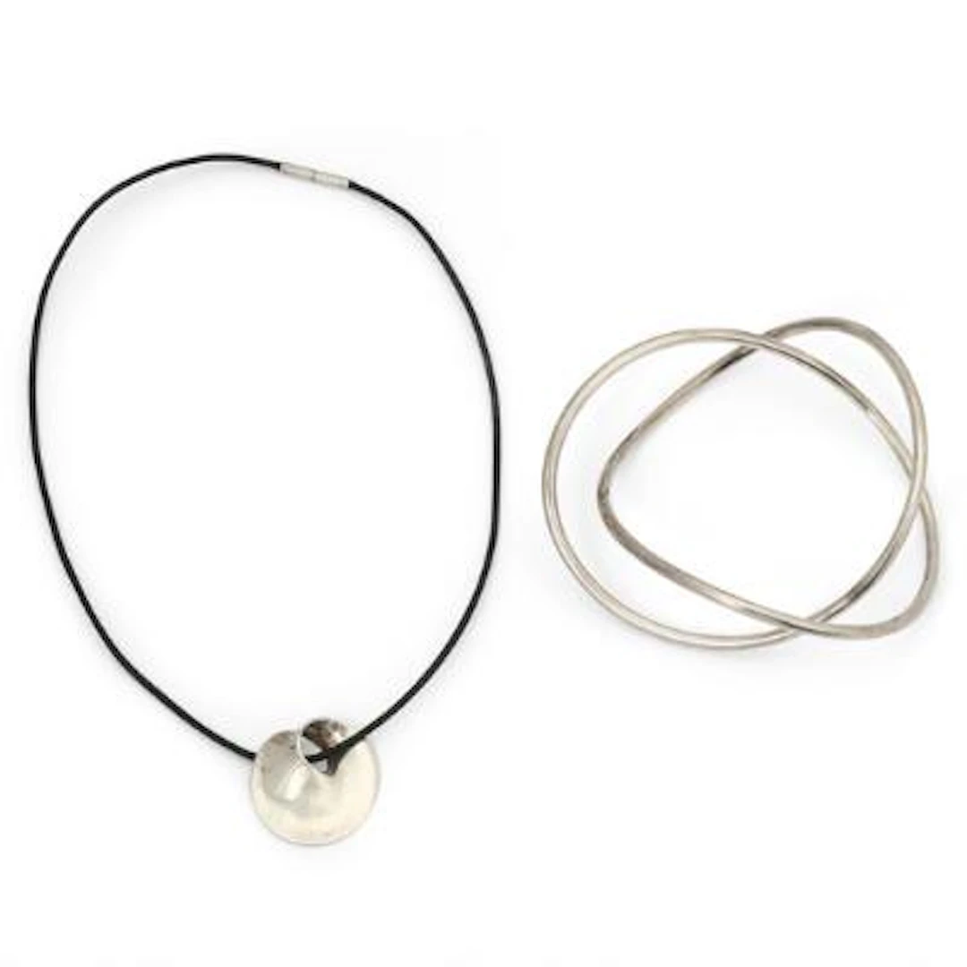 Vivianna Torun Bülow-Hübe: A bangle and pendant in sterling silver.