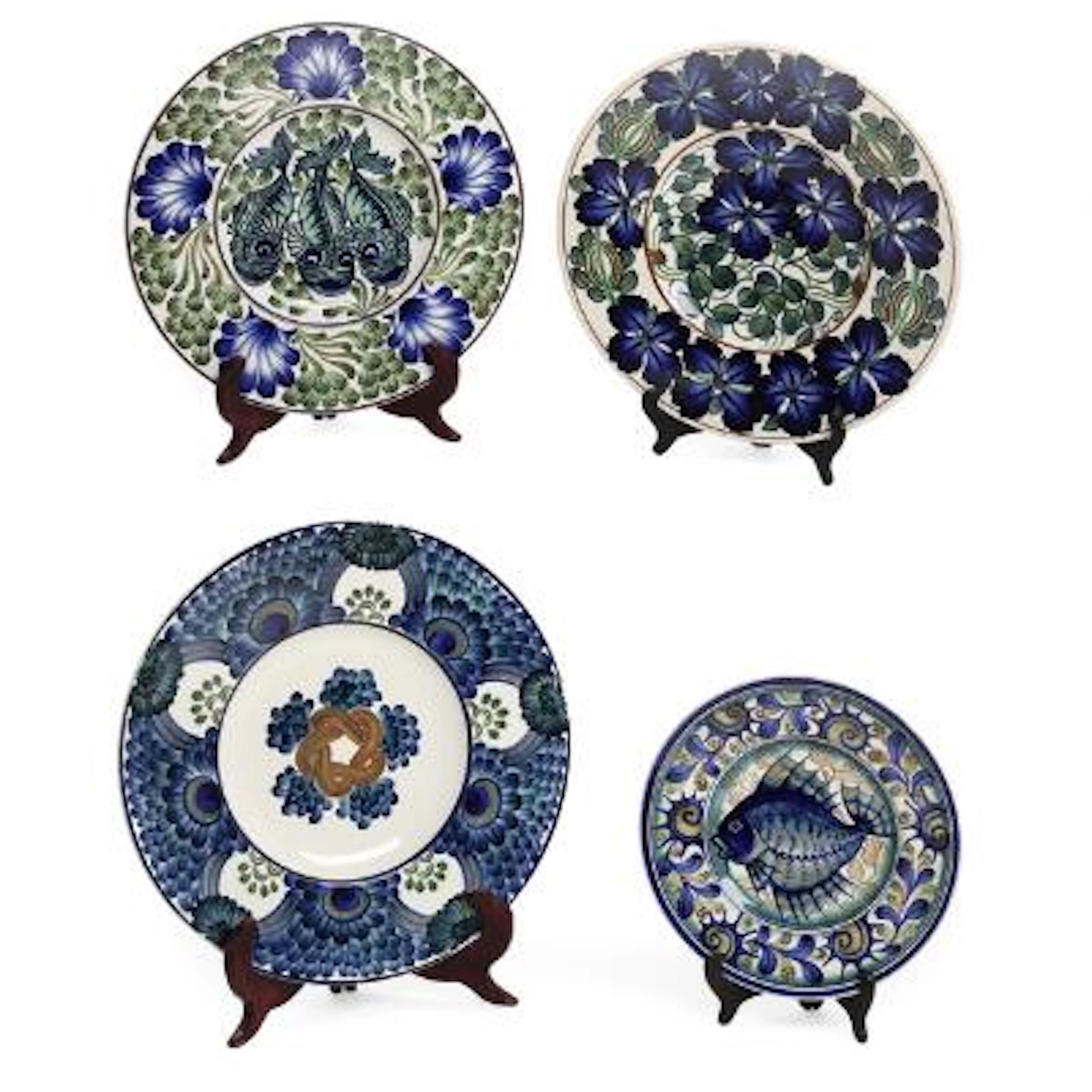 Harald Slott-Møller: Four faience wall plates, decorated with fish