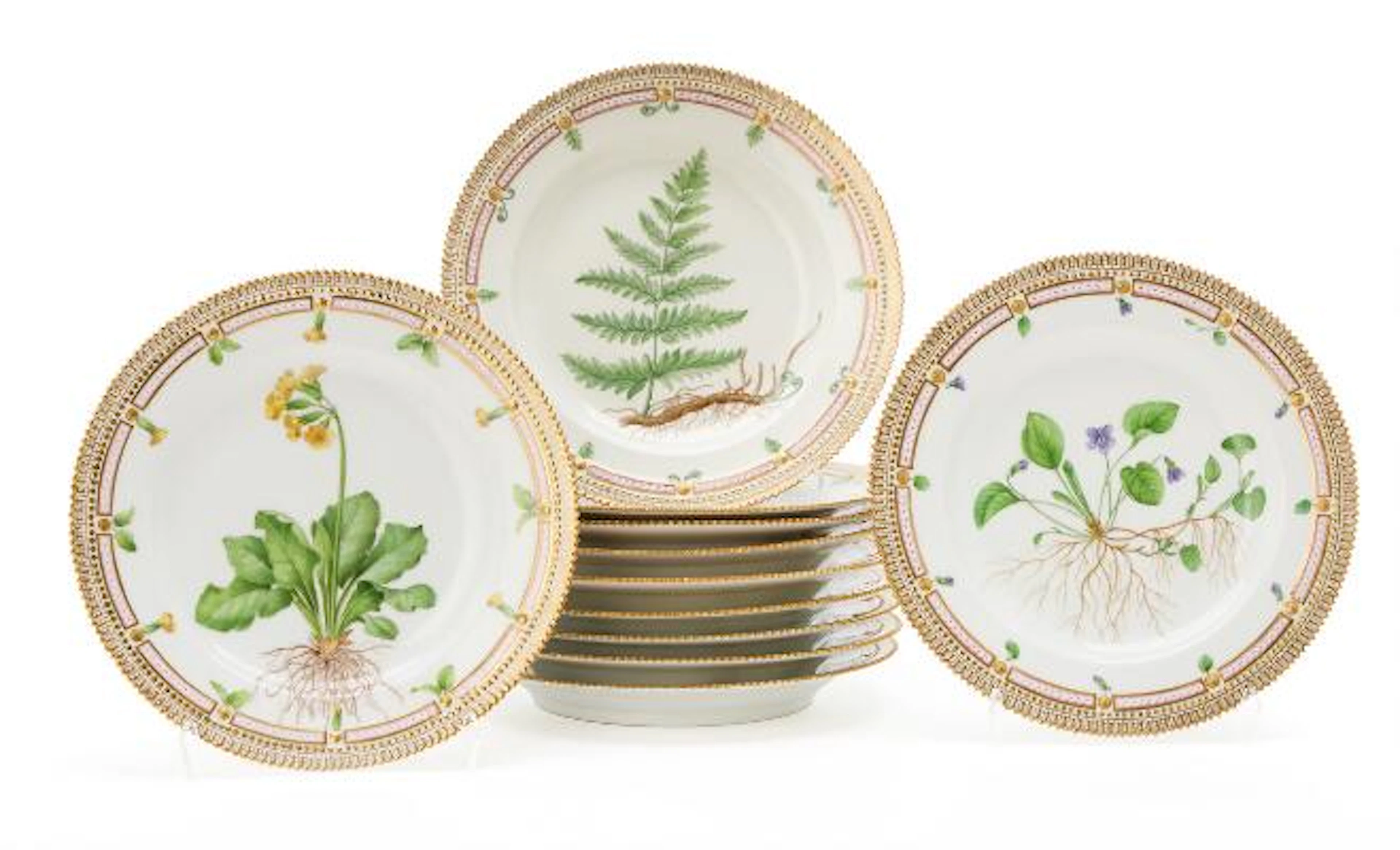 11 "Flora Danica" enamelled and gilt porcelain dinner plates. Royal