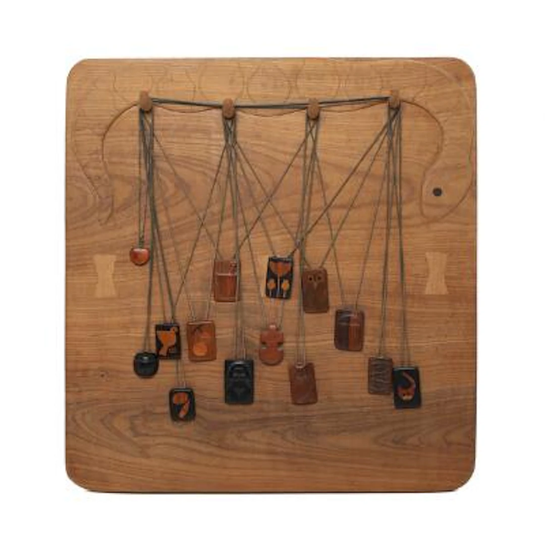 Jacob Hermann: A carved teak rack with 14 Brazilian rosewood, ebony