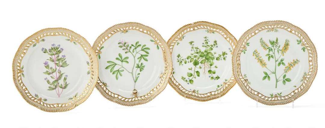 'Flora Danica' four enamelled and gilt porcelian lunch plates. Royal