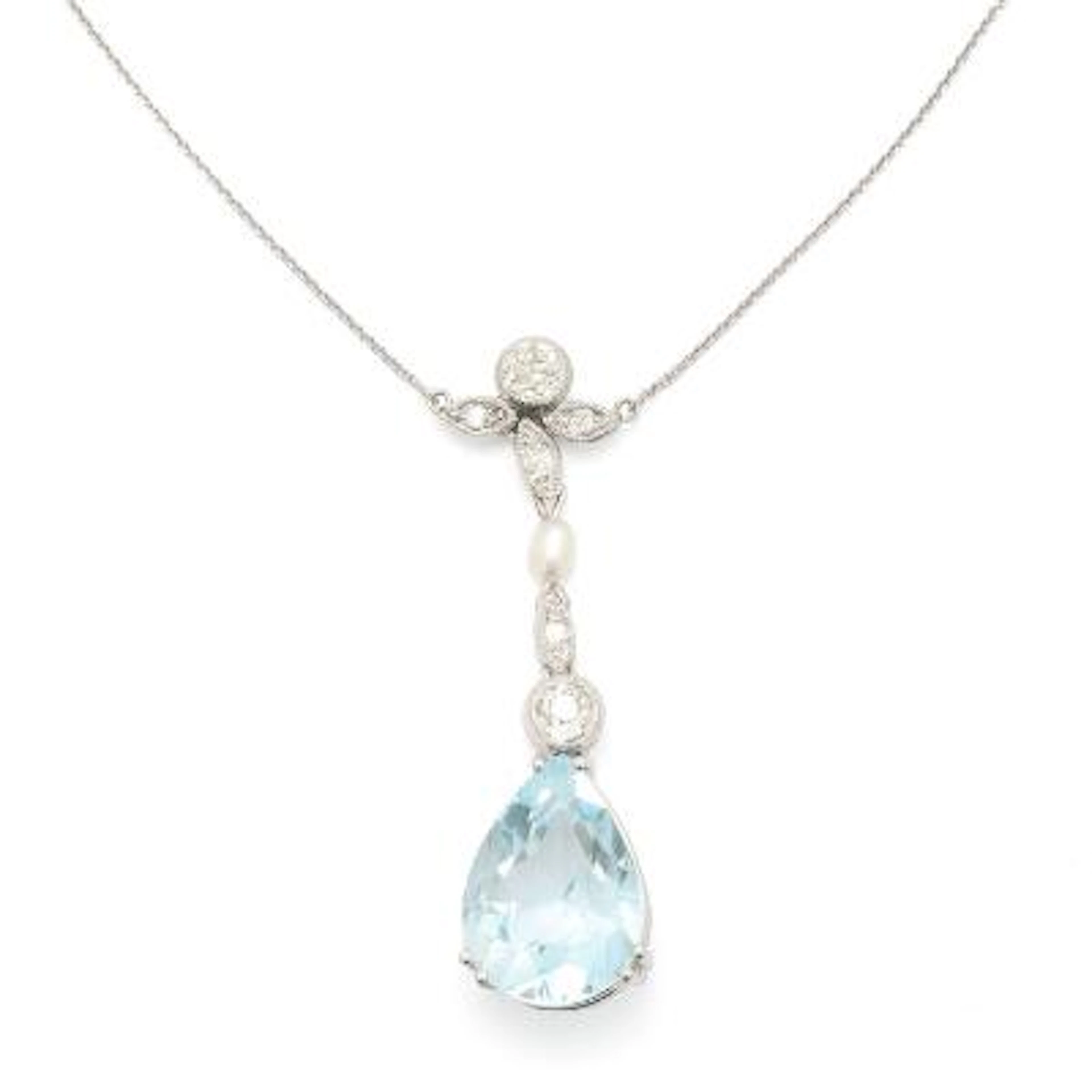 An aquamarine necklace set with a aquamarine, diamonds and pearl