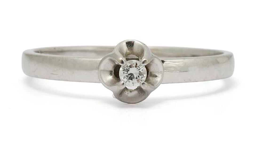 A diamond ring set with a brilliant-cut diamond weighing app. 0.45