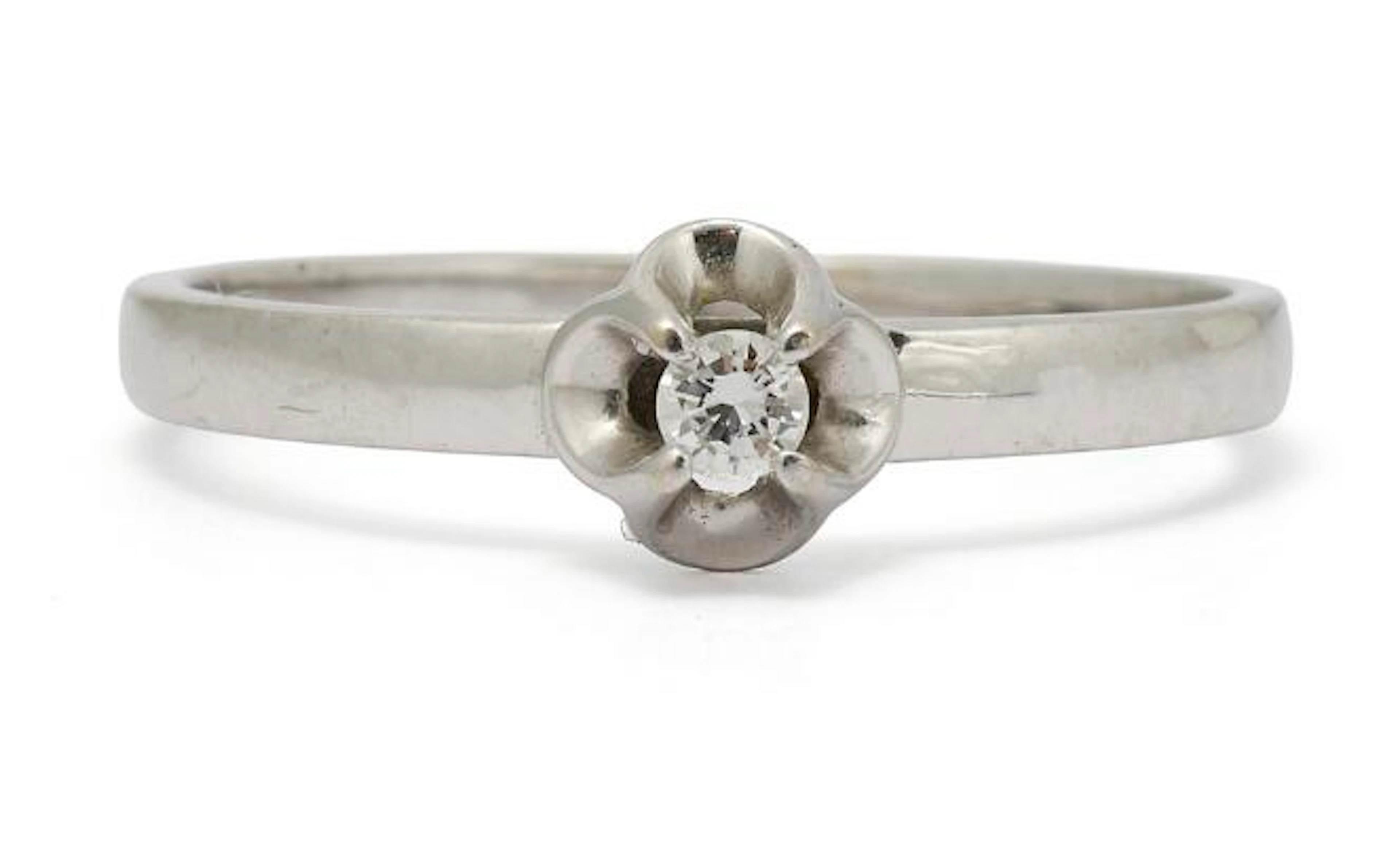 A diamond ring set with a brilliant-cut diamond weighing app. 0.45
