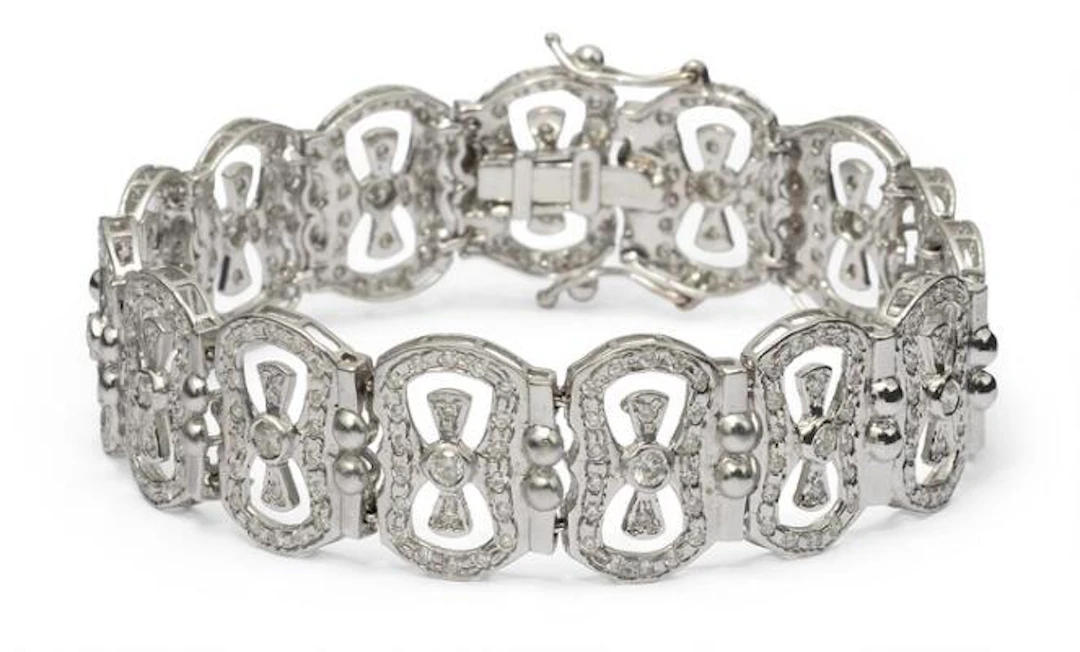 A diamond bracelet set with numerous diamonds, mounted in 14k white