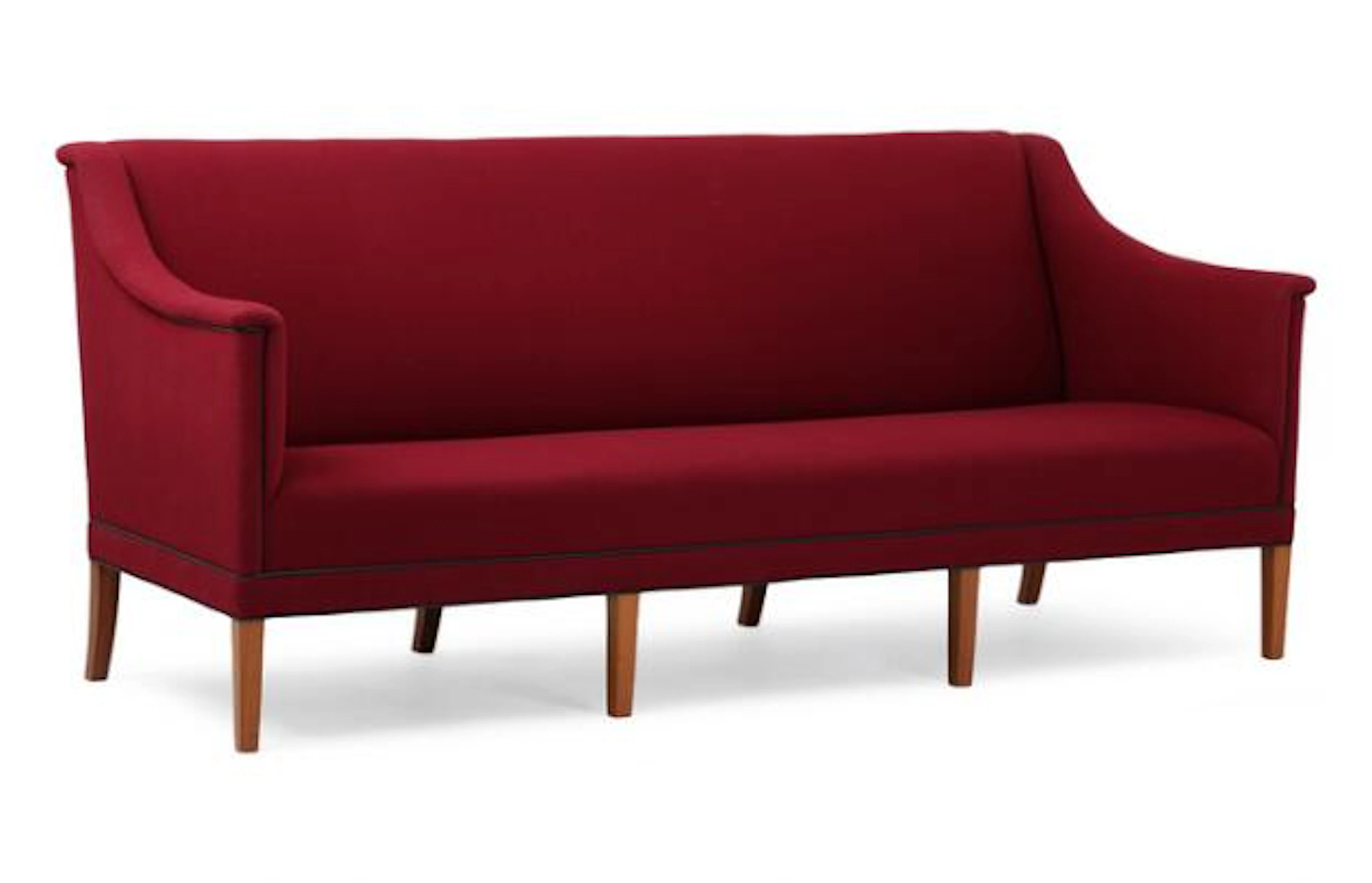 Kaare Klint: Three-person sofa with eight-legged mahogany frame. Upholstered