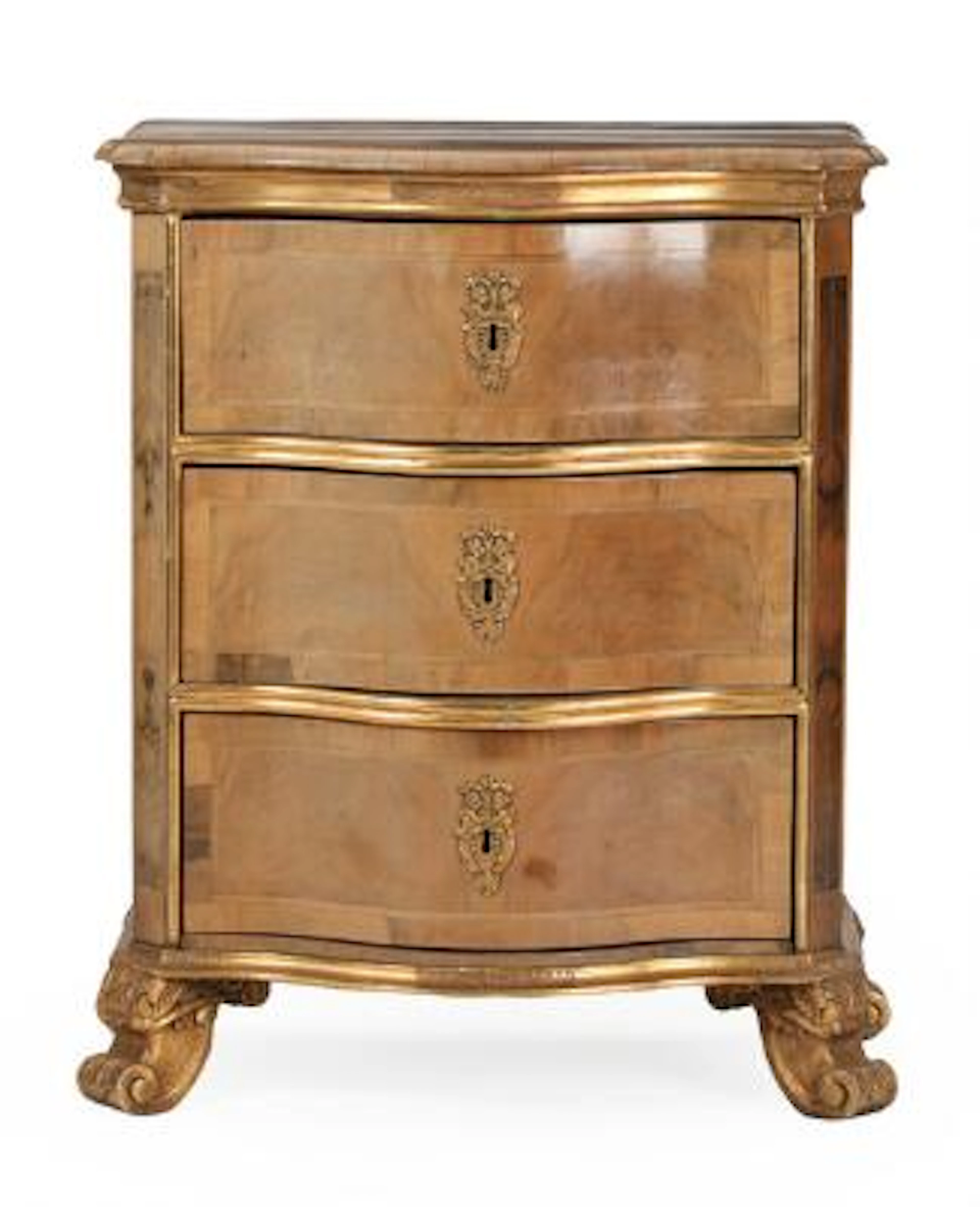 A Danish Rococo style walnut and giltwood commode. Late 19th century.