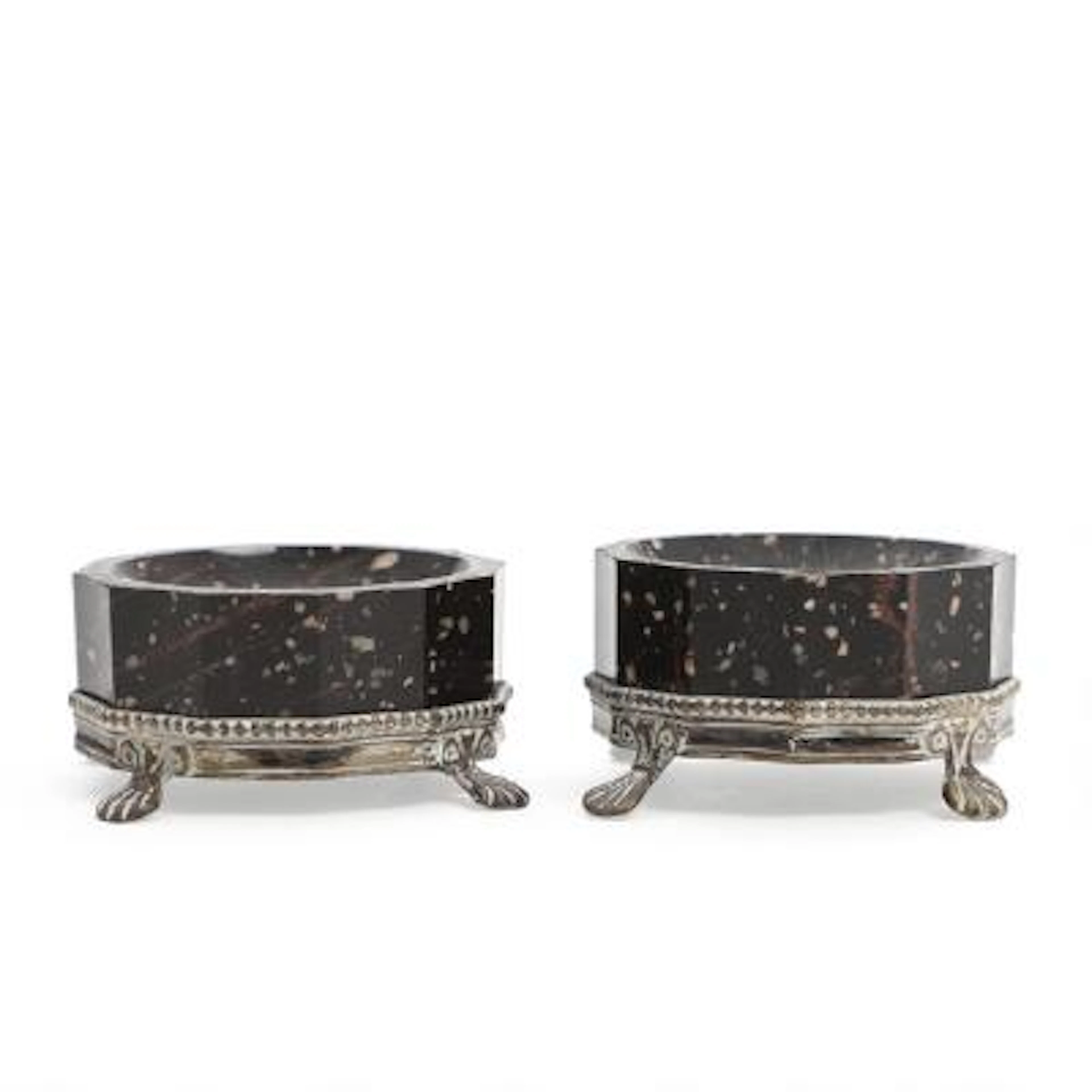 A pair of angular porphyry salt cellars with Swedish silver mounts.