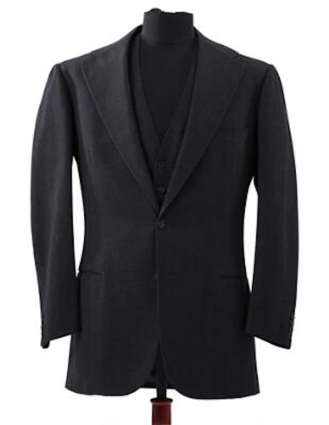 Alfred Alm: A charcoal grey flannel jacket with matching waistcoat.