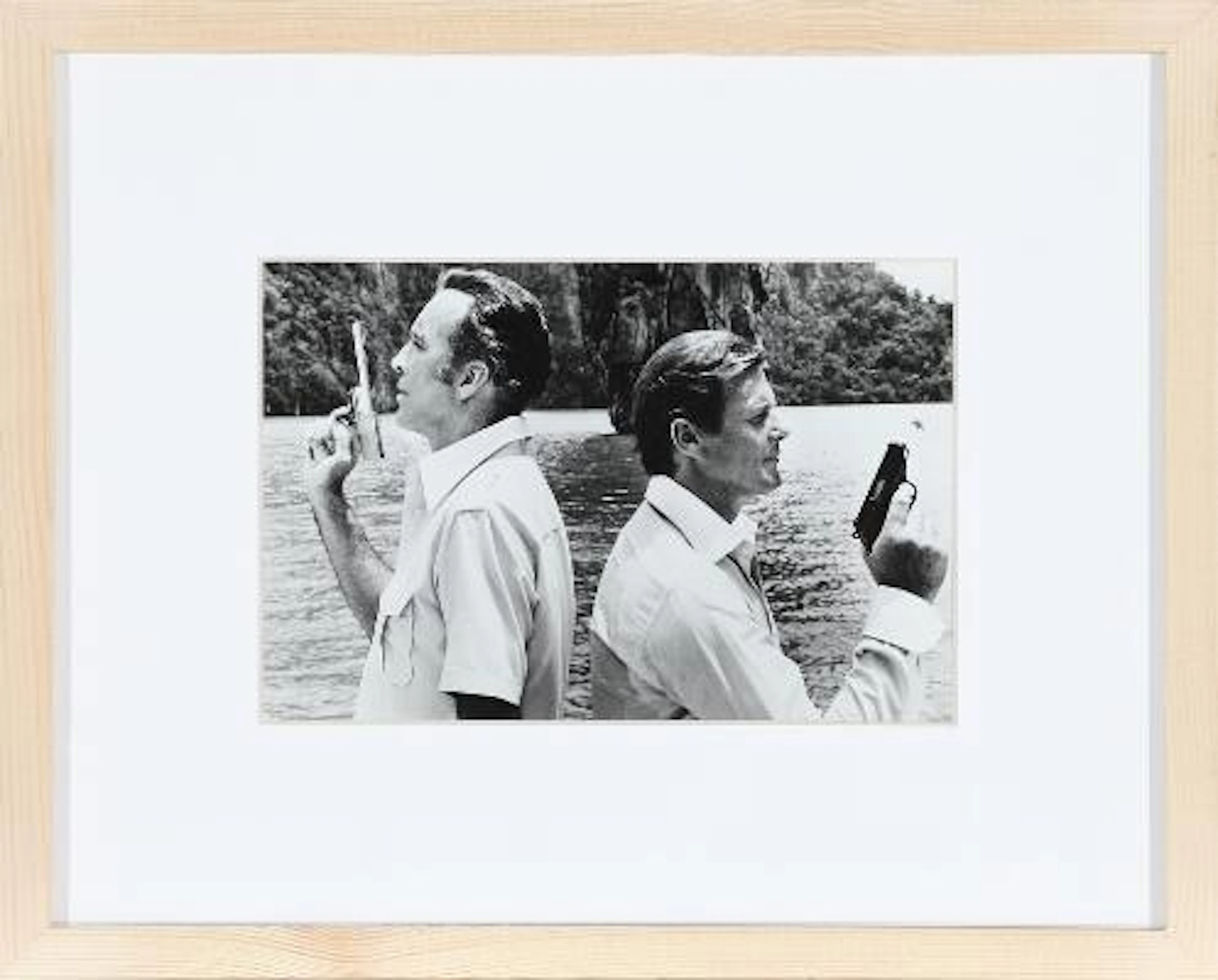 'The Man with the Golden Gun'. Black-and-white press photograph of