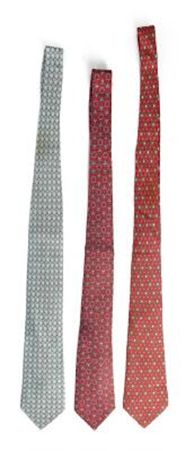 Hermès: A collection comprising of three silk ties each set with motif.