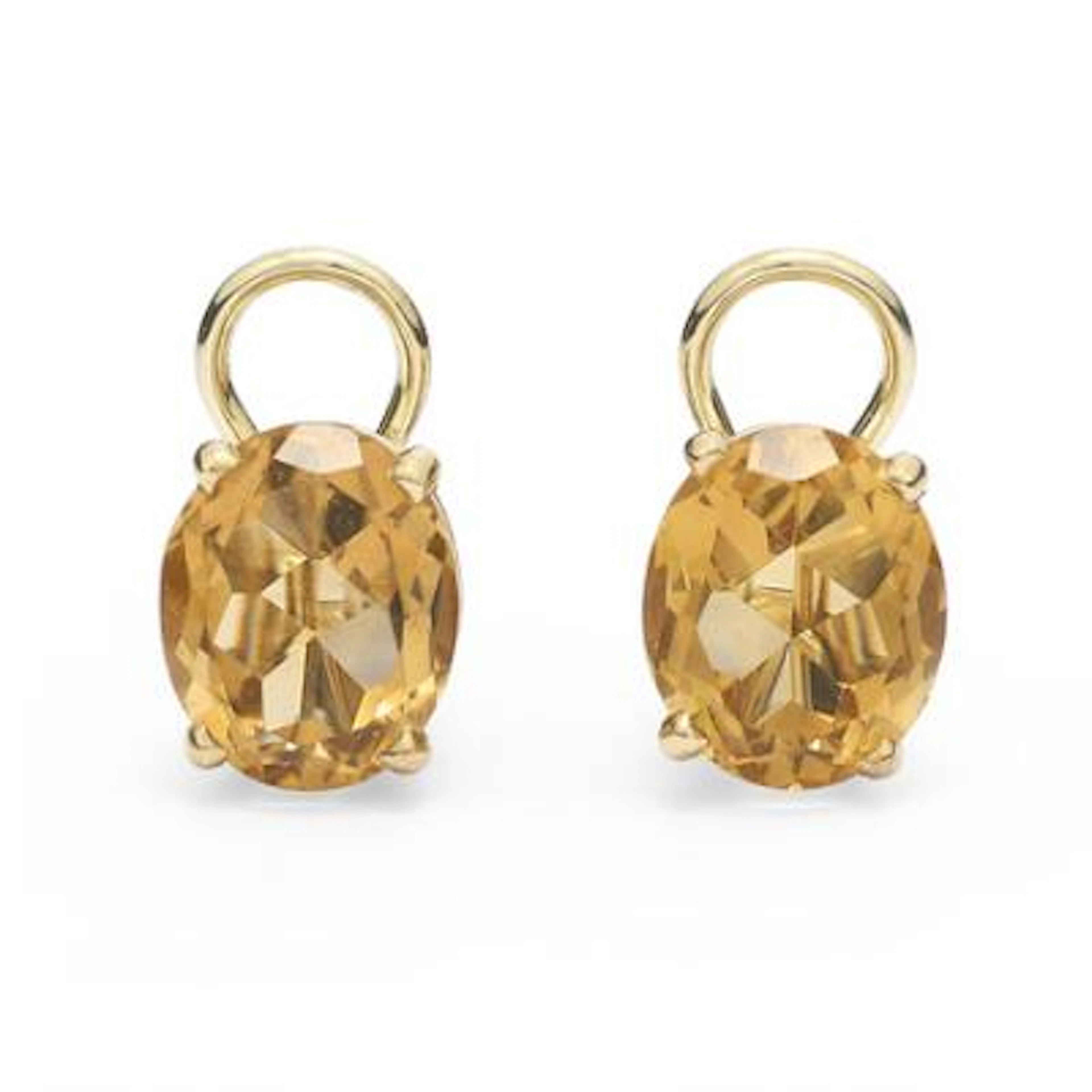 A pair of citrine ear clips each set with a citrine mounted in 14k