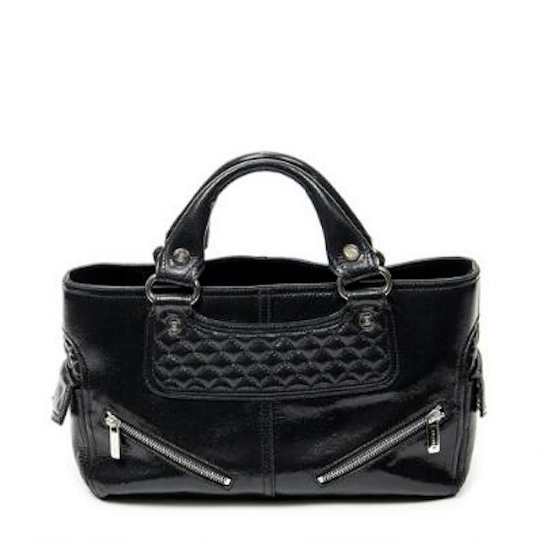 Celine: A "Biker Boogie" bag in black metallic leather with two handles