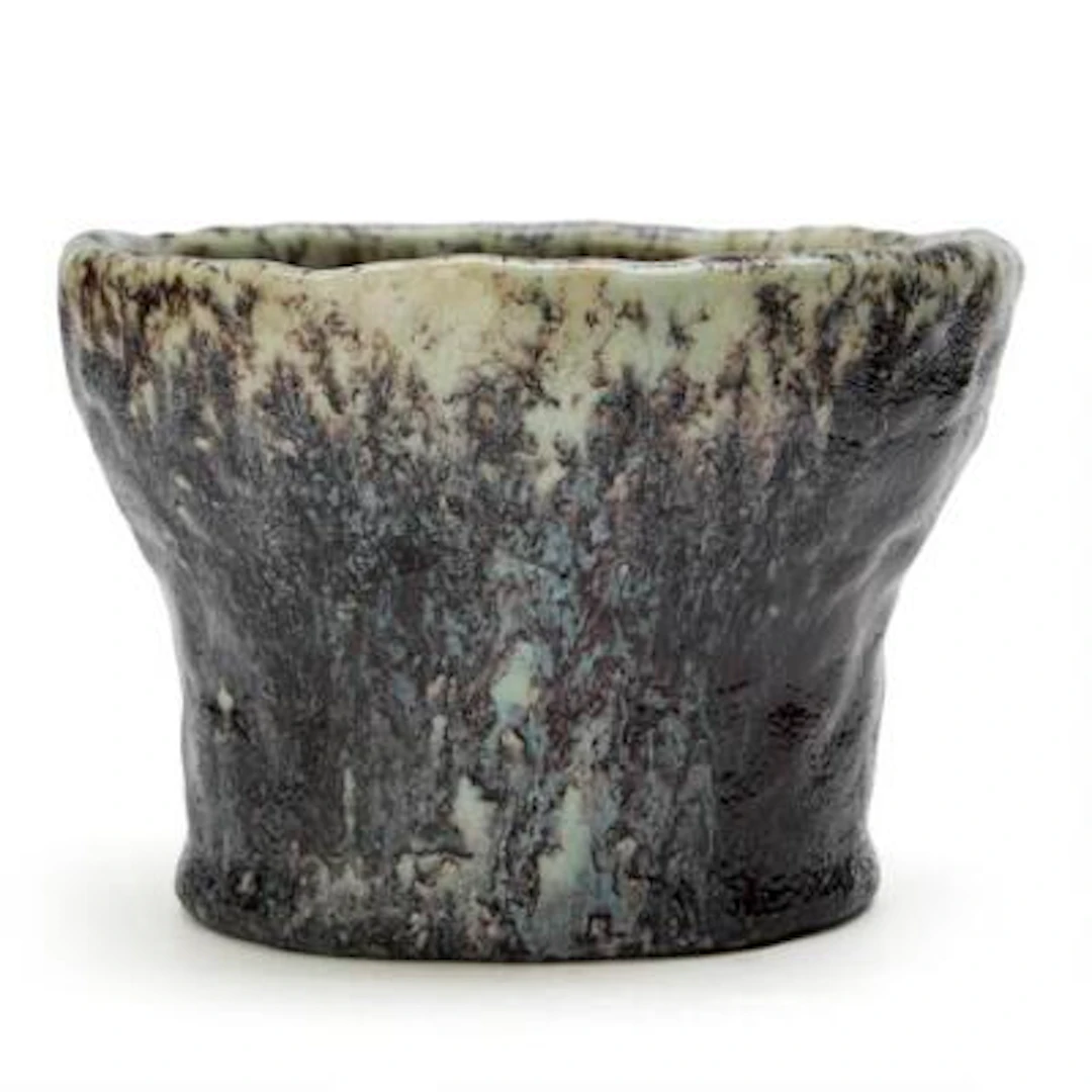 Bente Skjøttgaard: A stoneware vase decorated with dark red and light