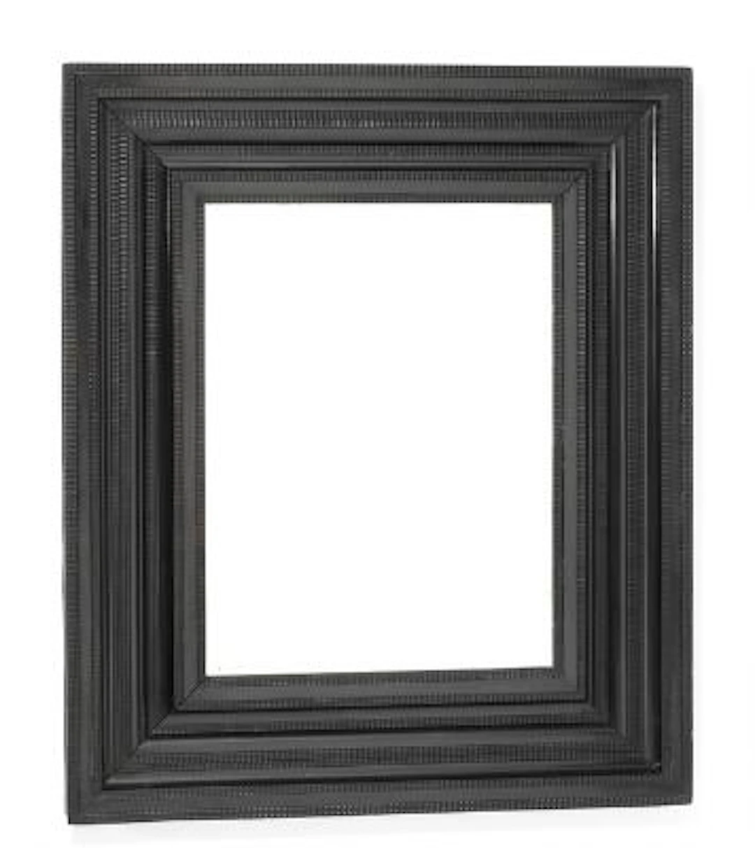 A Flemish baroque picture frame with later mirror glass. C. 1700.