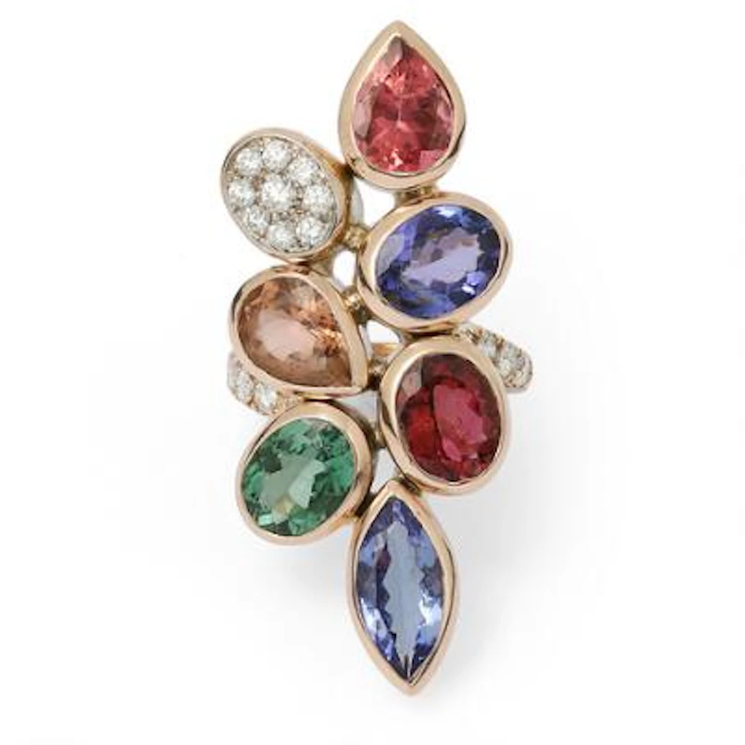 A ring set with tourmalines, tanzanites and diamonds mounted in 9k