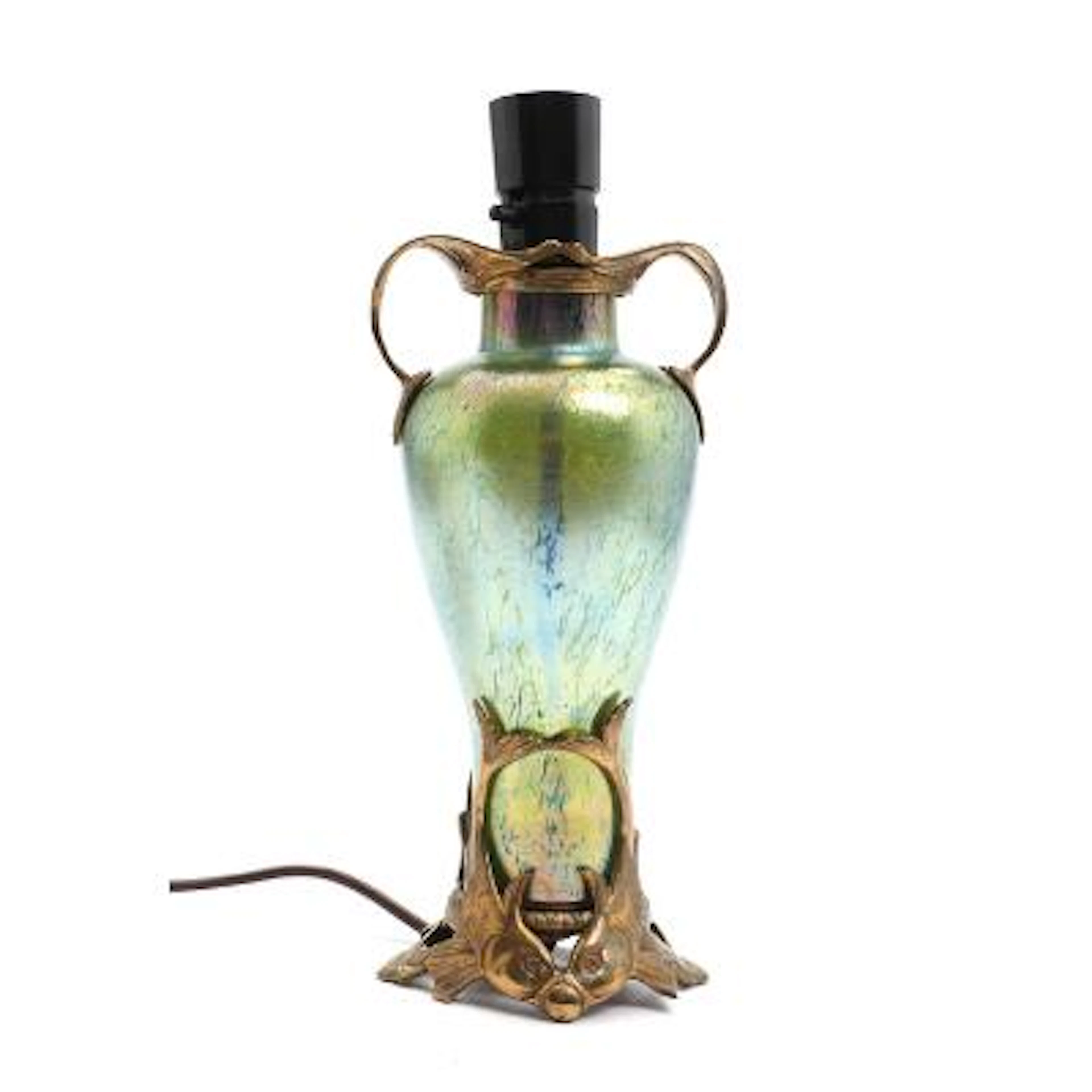 Art Nouveau table lamps of iridescent green glass with bronze mounting.